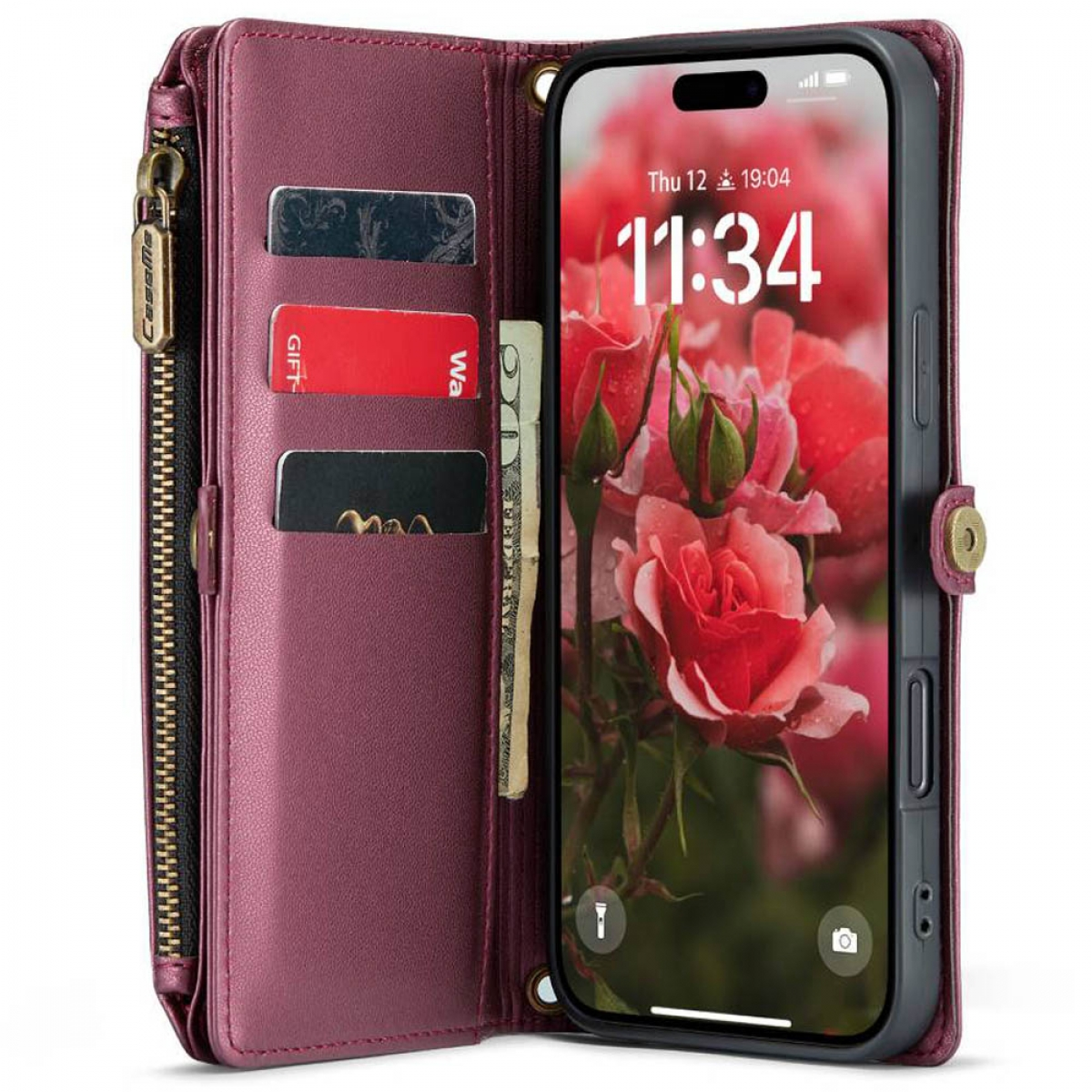 Eine weinrote Handyhülle mit Telefon, Karten und Bargeld. Sie ist geöffnet und zeigt einen Reißverschluss und ein rosa Blumenbild.