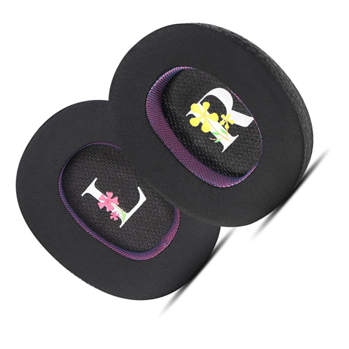 Due cuscinetti auricolari neri con inserti rosa e floreali, etichettati 'L' e 'R'.