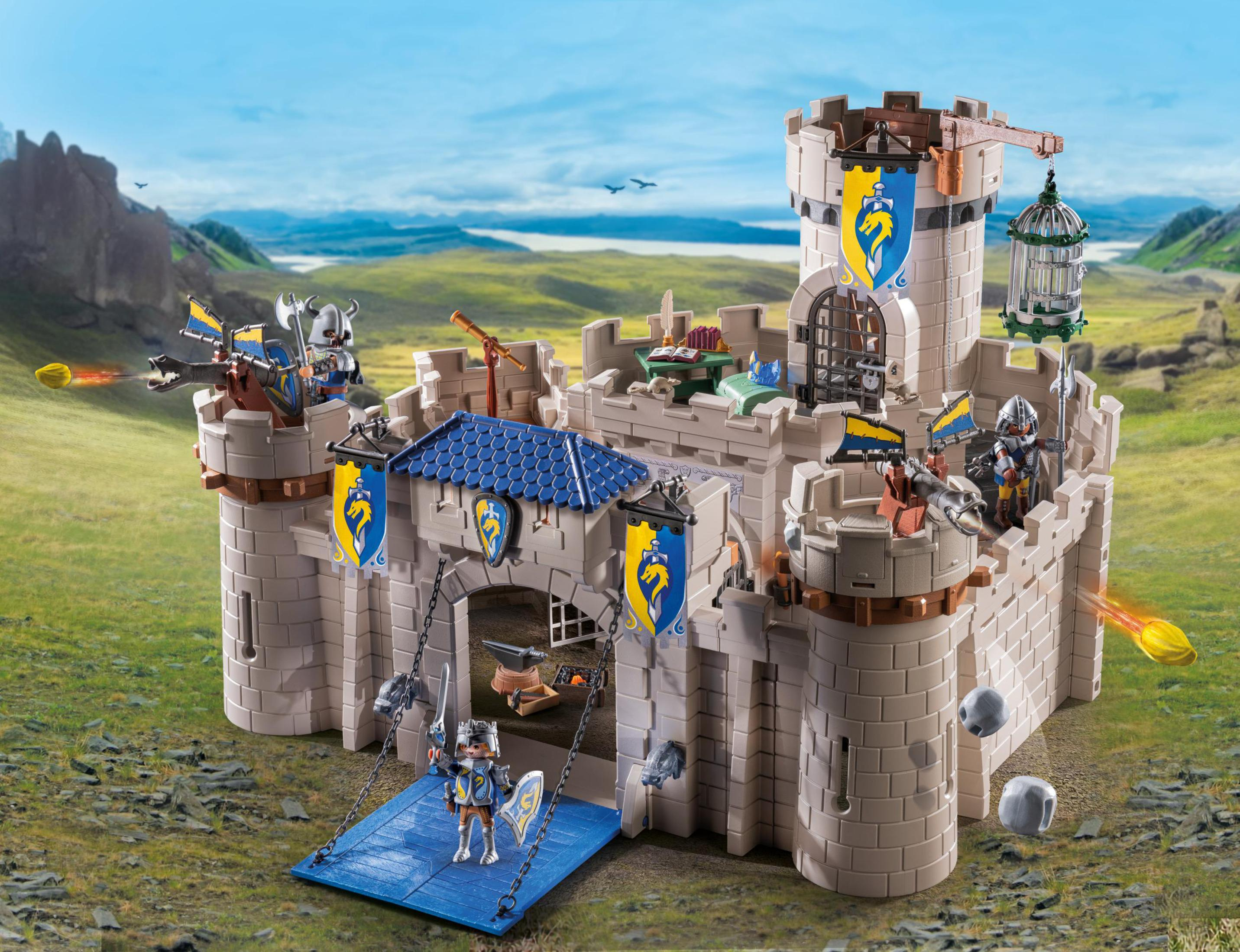 Castello giocattolo con cavalieri, ponte levatoio e figure in azione, con proiettili.