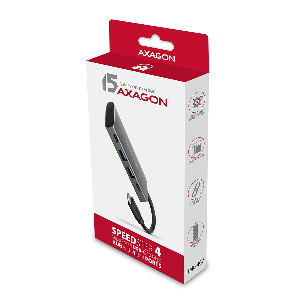 Scatola con un hub USB. L'hub è grigio con 4 porte e un cavo USB nero.