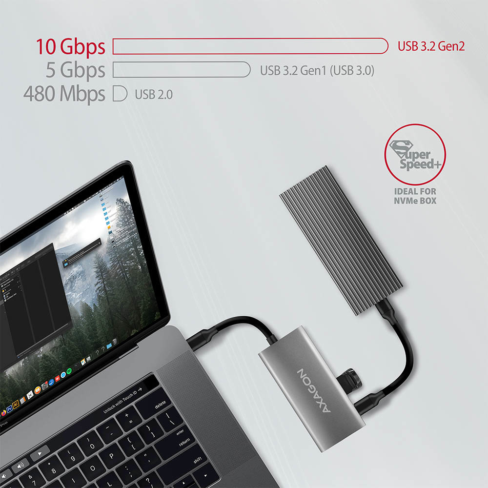Hub argentato, laptop e disco esterno. Indicatori di velocità in alto.