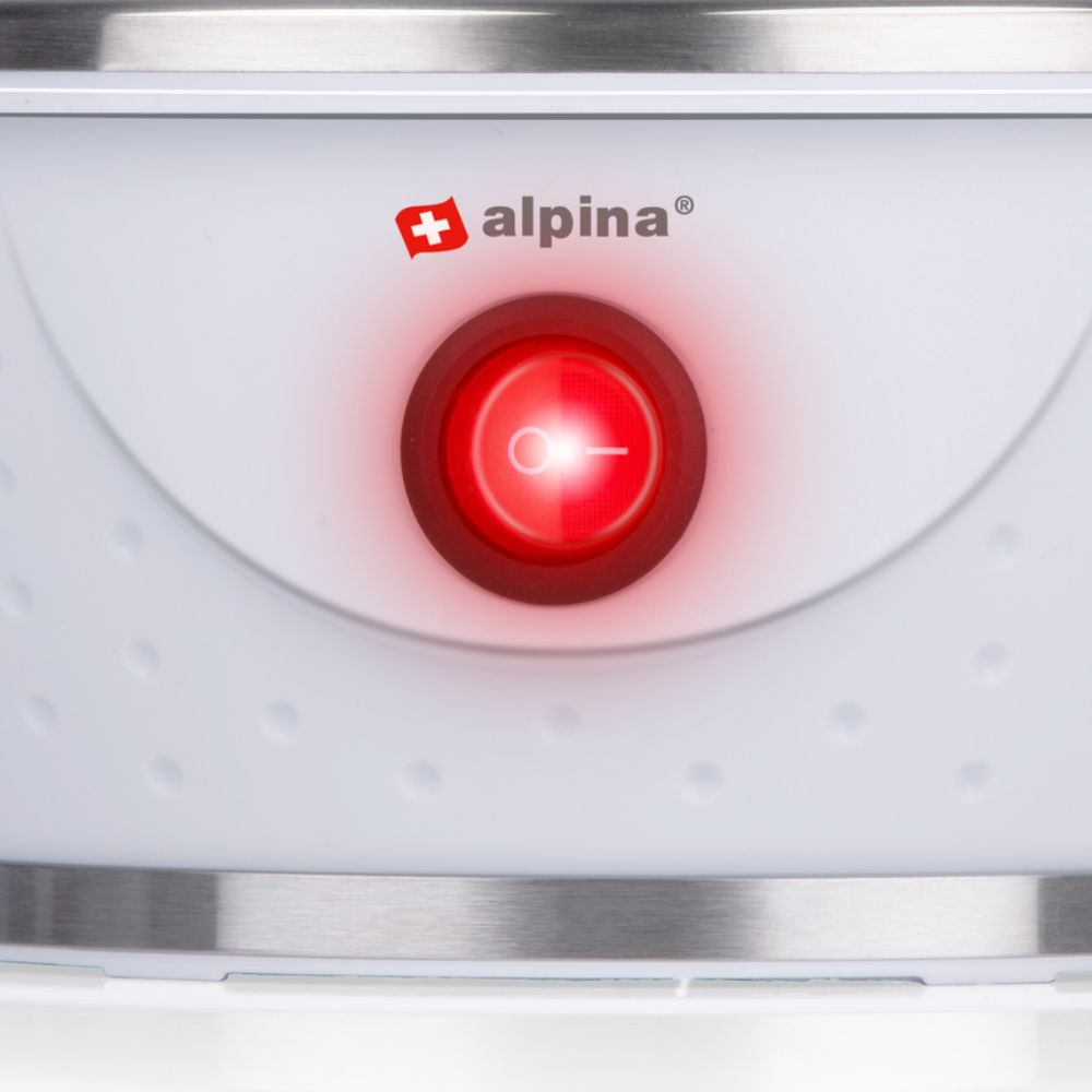 Close-up of a white appliance with a red power button. The Alpina logo is visible.