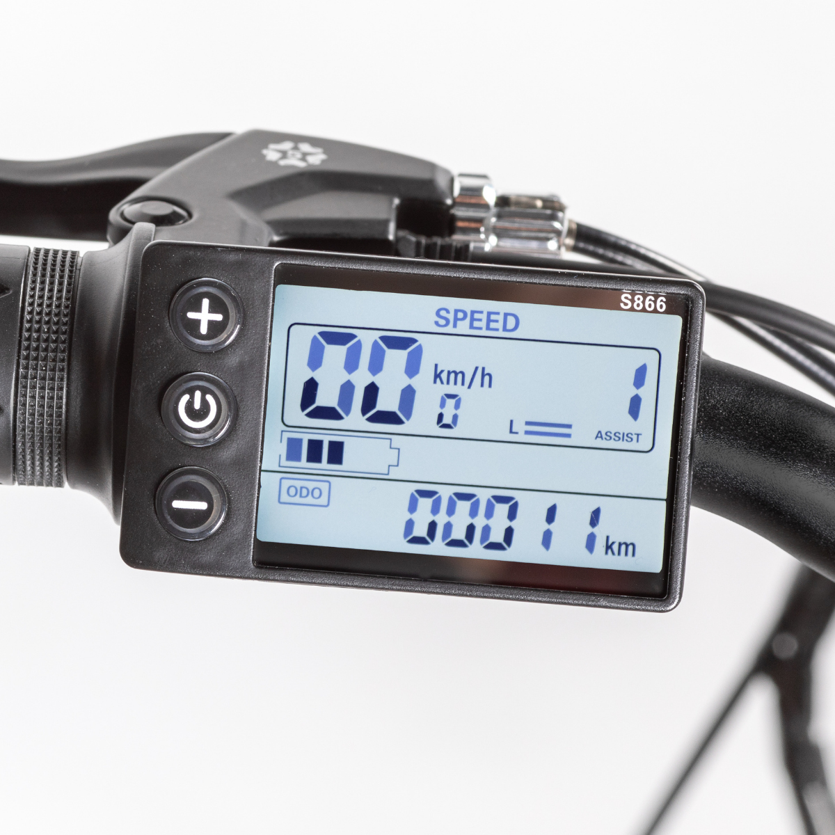 Wyświetlacz roweru elektrycznego pokazuje prędkość, km/h, poziom wspomagania i dystans.