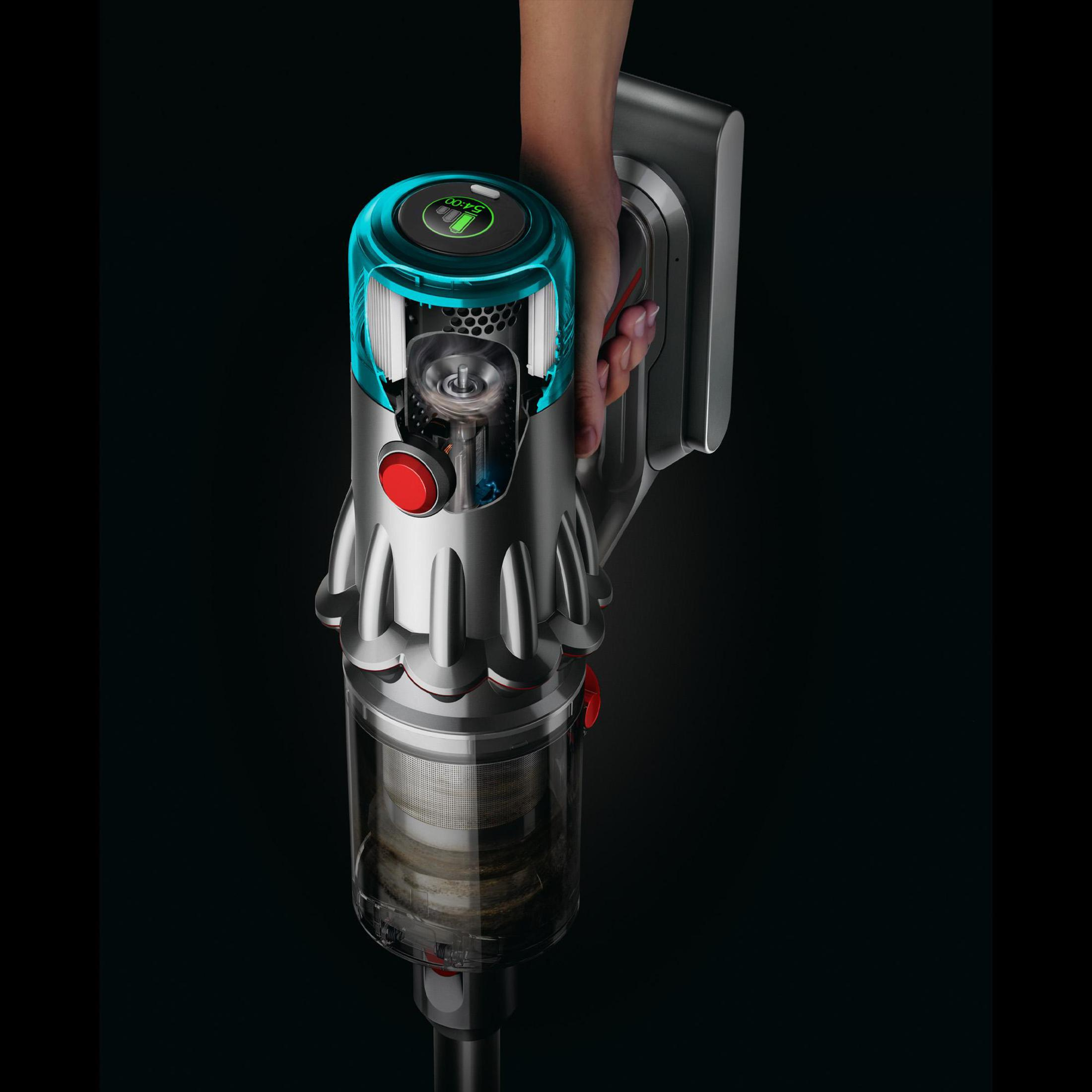 Hand hält einen Dyson-Staubsauger, Schnittansicht. Zeigt Motor, Filter und Batteriestandsanzeige.