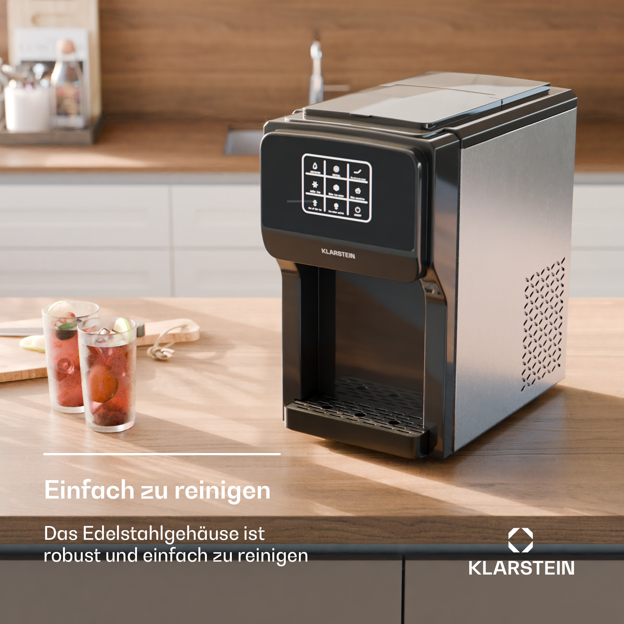 Schwarzer und silberner Wasserdispenser für die Theke. Er hat Touch-Bedienelemente und einen Wasserauslass.