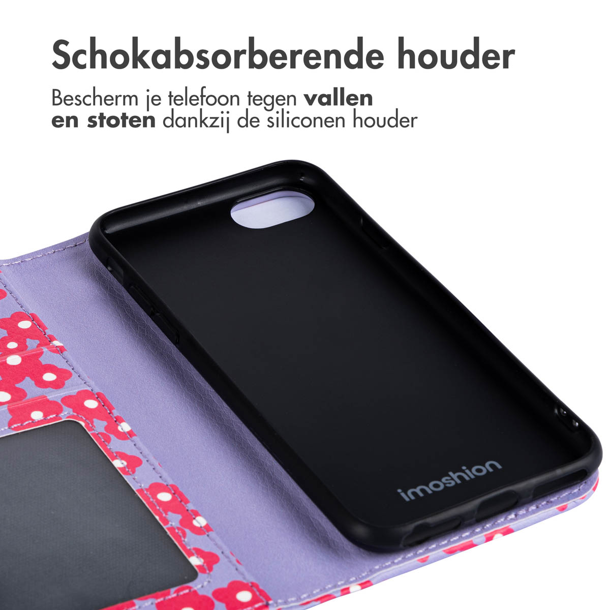 Een telefoonhoesje met een bloemenpatroon aan de buitenkant en een zwarte telefoon erin.
