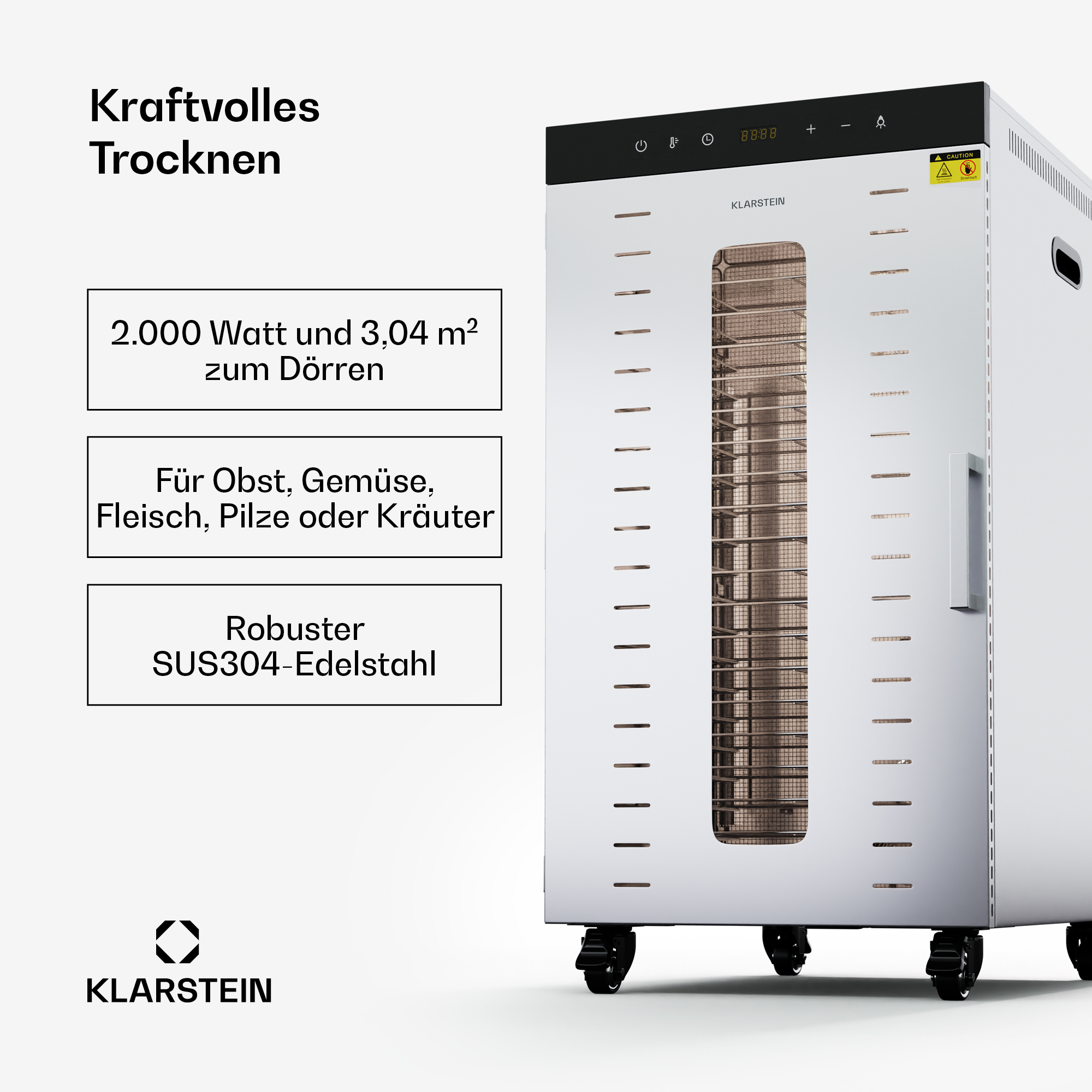 Weißer und silberner Dörrautomat mit Text. Er steht auf Rädern und hat mehrere Einschübe.