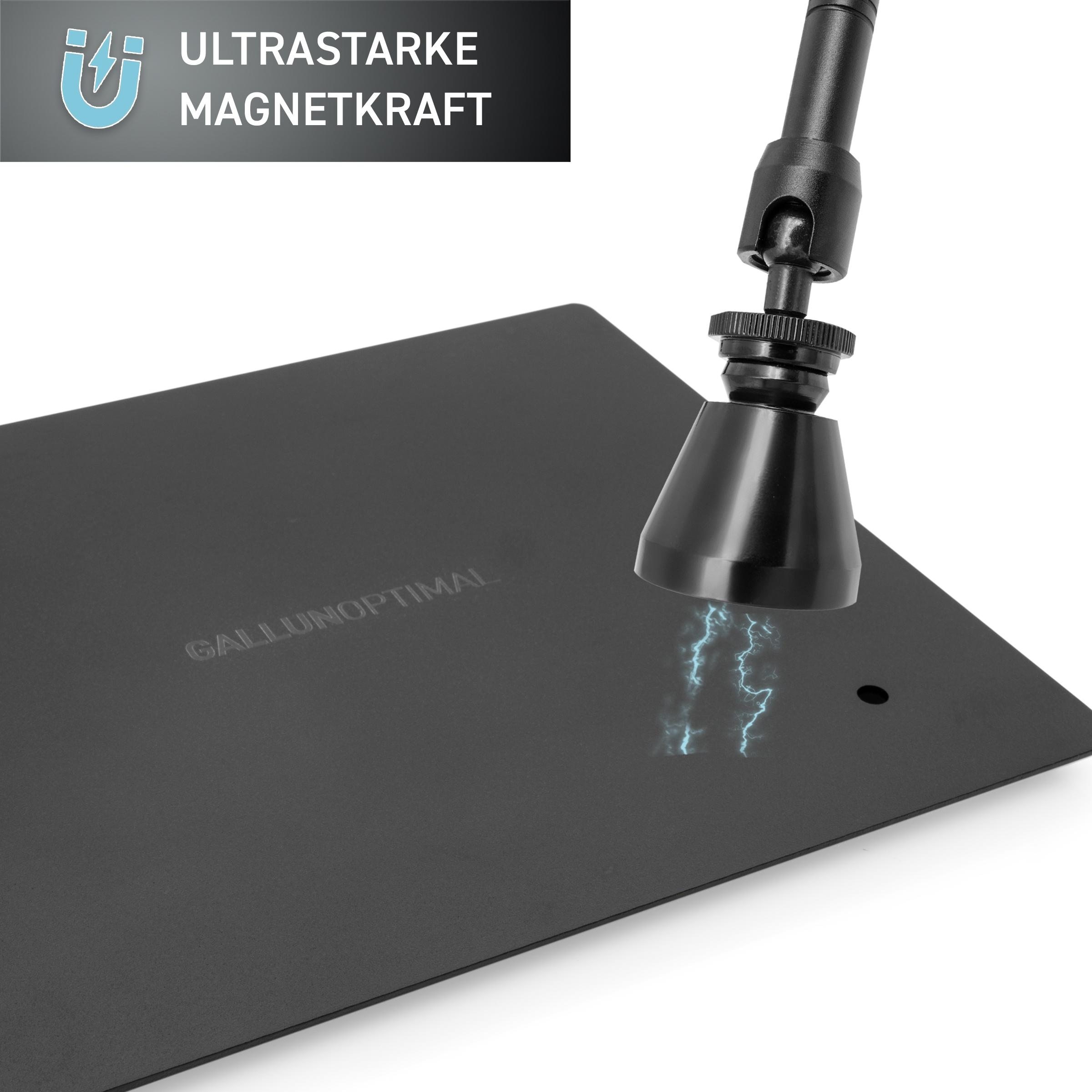Eine schwarze Platte mit einem Magnetarm. Der Arm ist befestigt und hat einen Blitzeffekt.