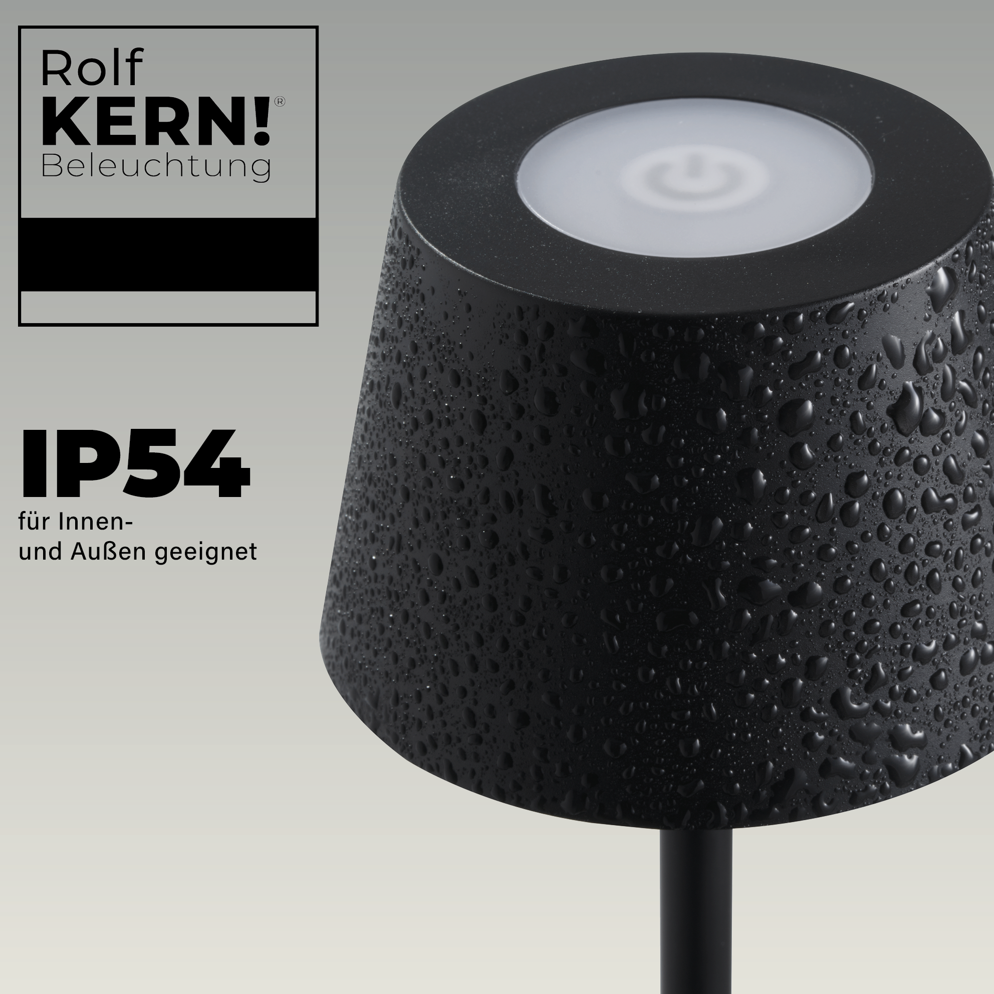 Eine schwarze Lampe mit Wassertropfen, dem Logo Rolf Kern und dem Text IP54.