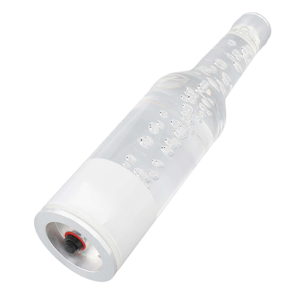 Klare Glasflasche mit Flüssigkeit und Blasen. Silberner Sockel und ein schwarzer Knopf am Boden.