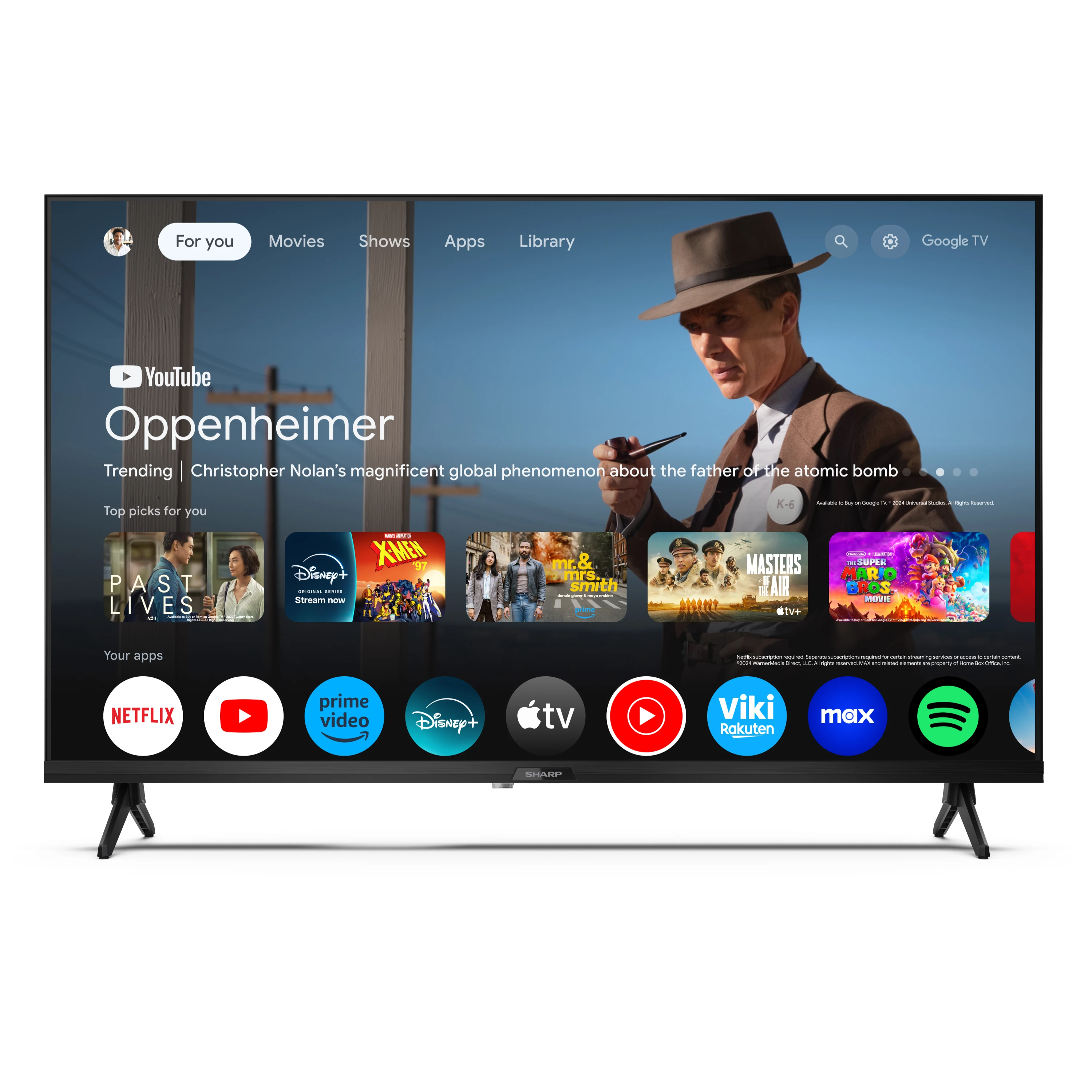 Un televisore a schermo piatto che mostra un'interfaccia di servizio di streaming di film. Il televisore è nero e su un supporto.