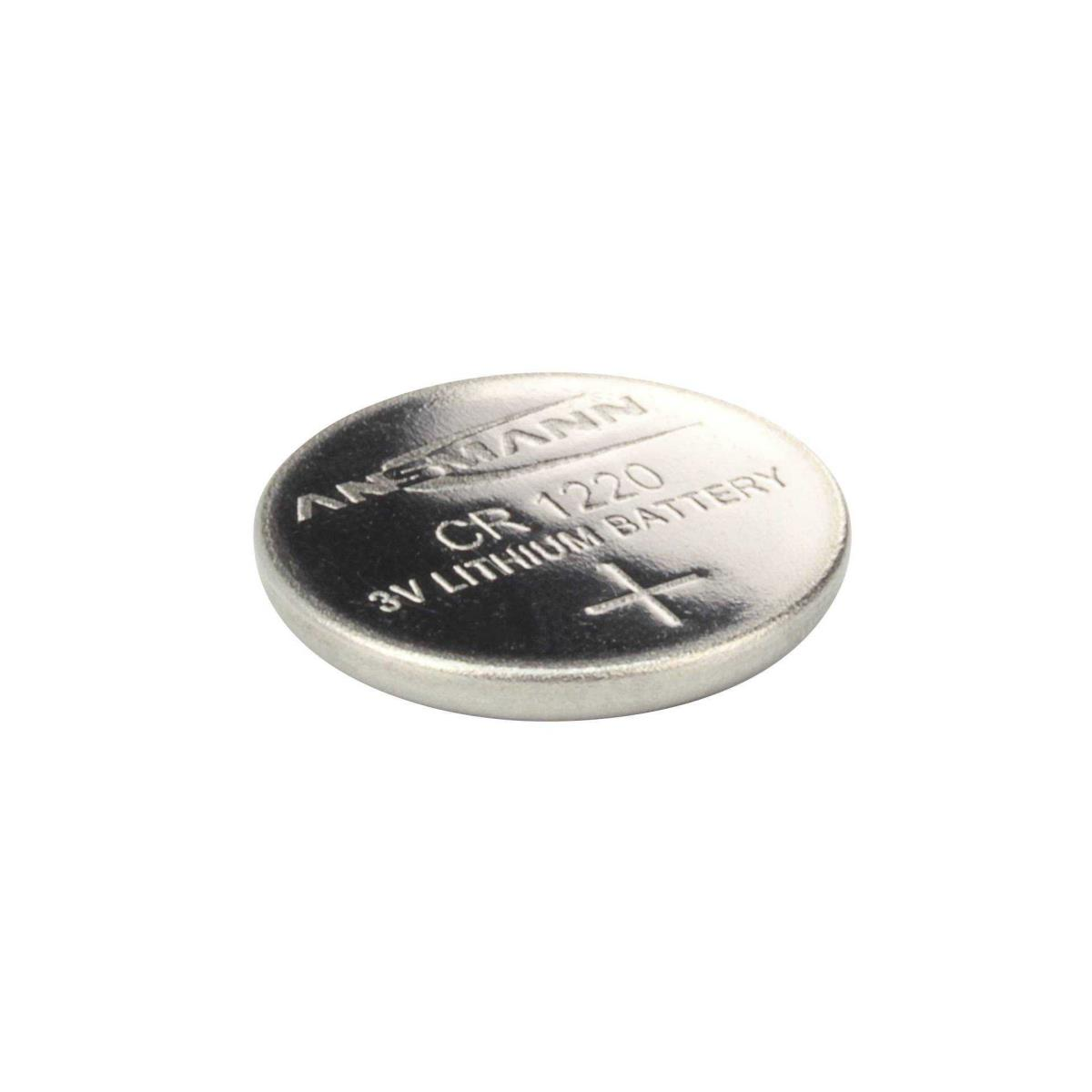 Una batteria CR1220 argentata, con testo