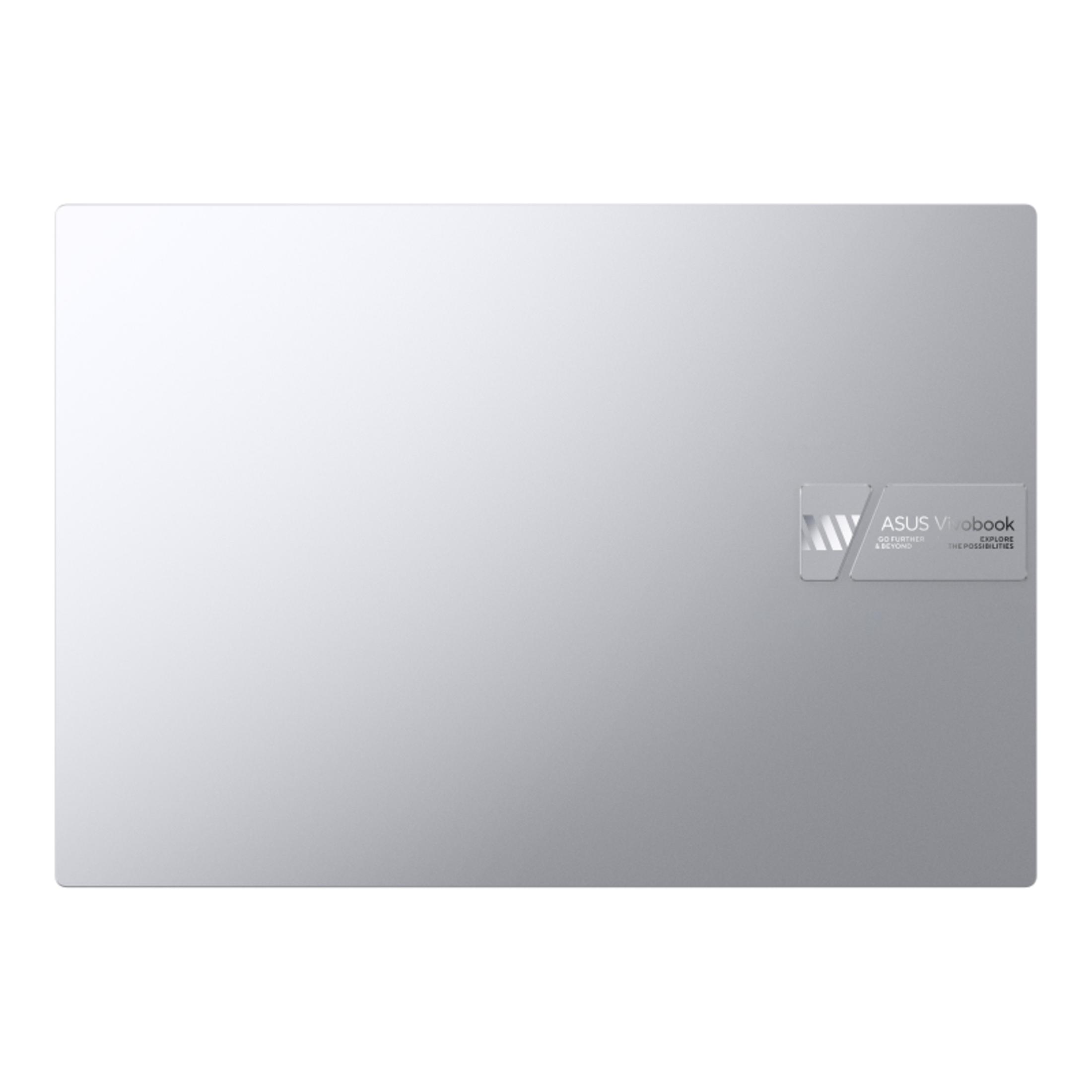 Ein silberner Laptop mit dem ASUS Vivobook Logo auf der Rückseite.