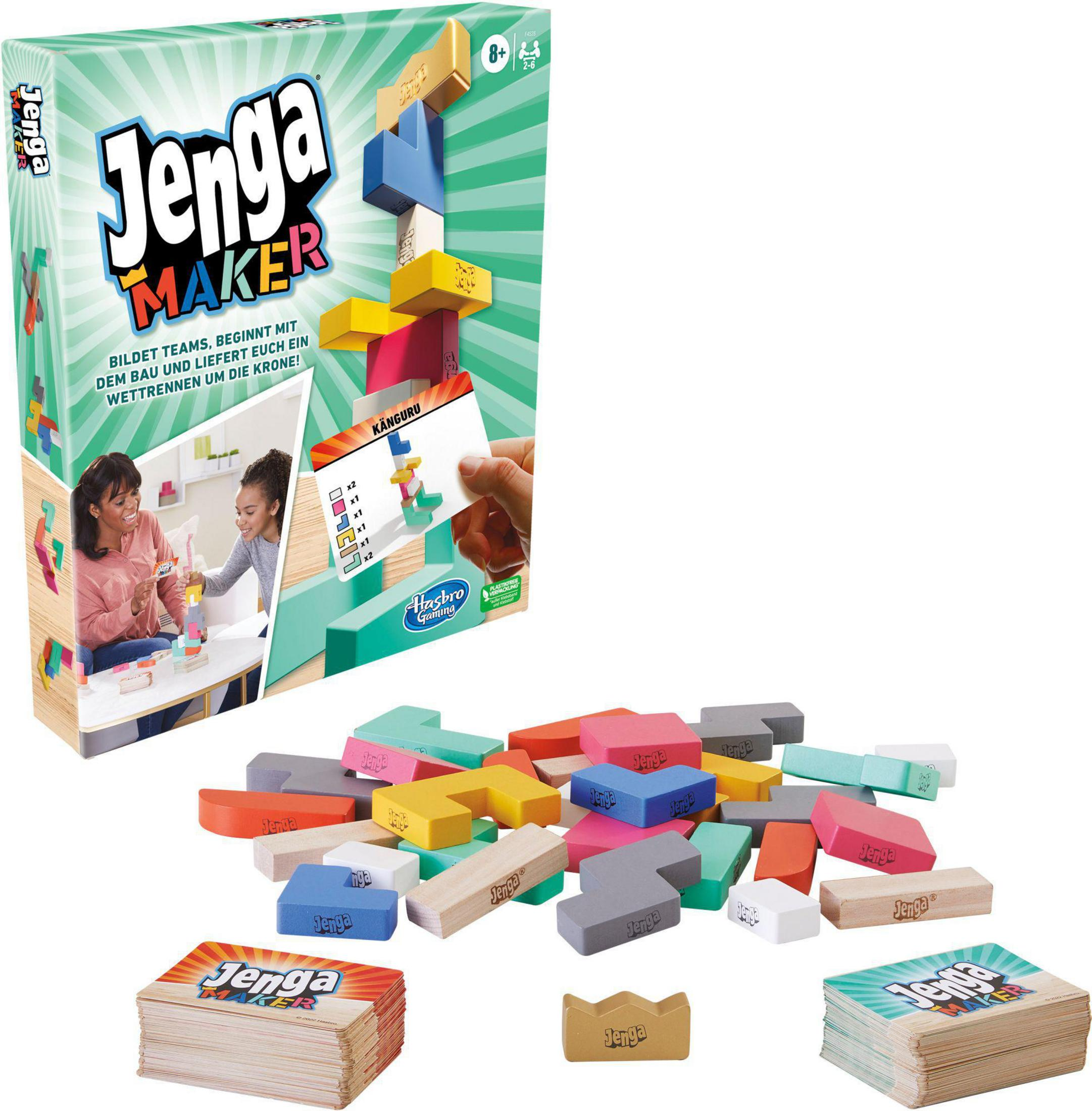 Jenga Maker-Box mit Spielsteinen. Zwei Frauen spielen, mit einem Turm aus Blöcken und Karten.