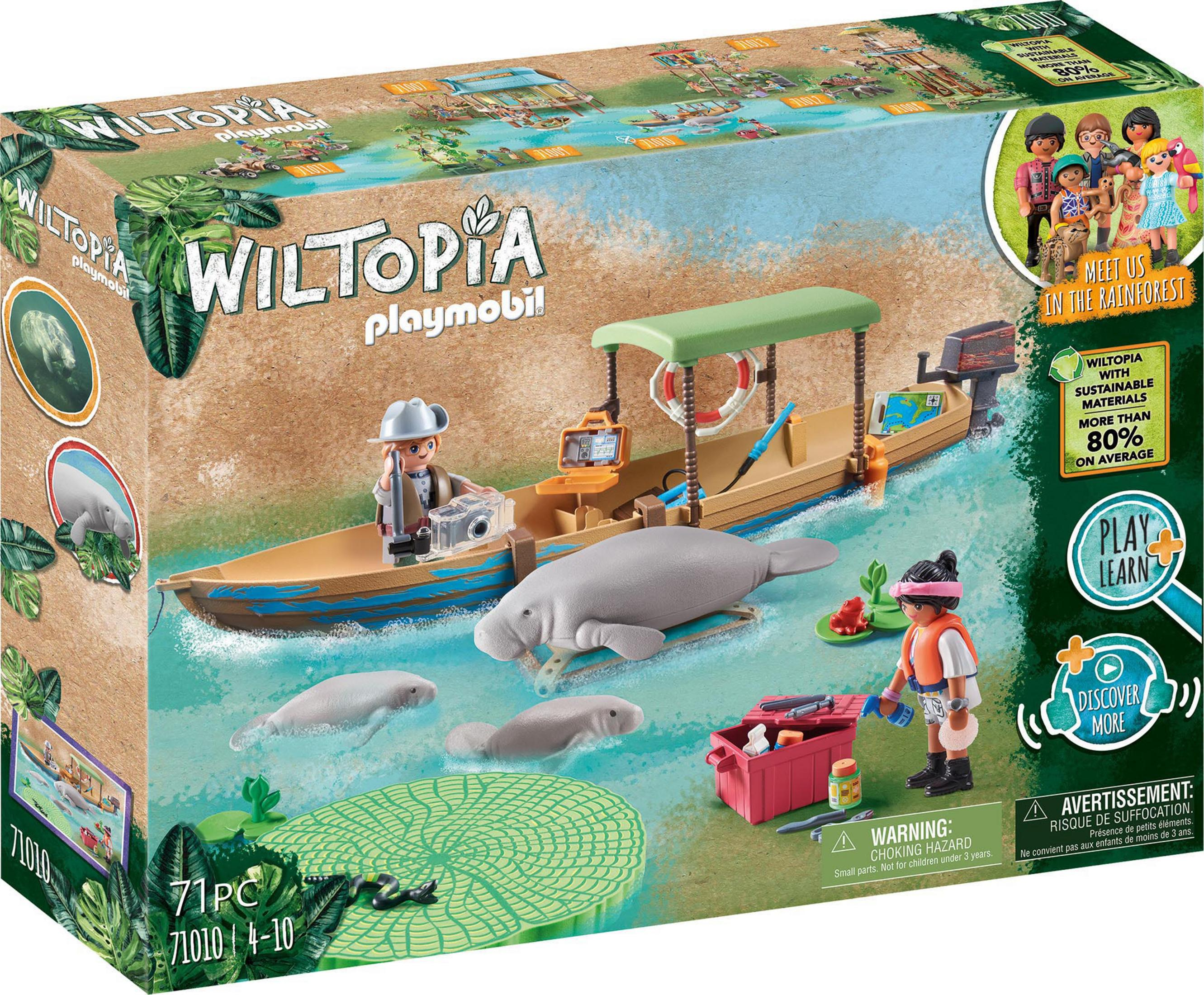 Zestaw Playmobil Wiltopia, z łodzią, figurkami, manatami i tłem lasu deszczowego.