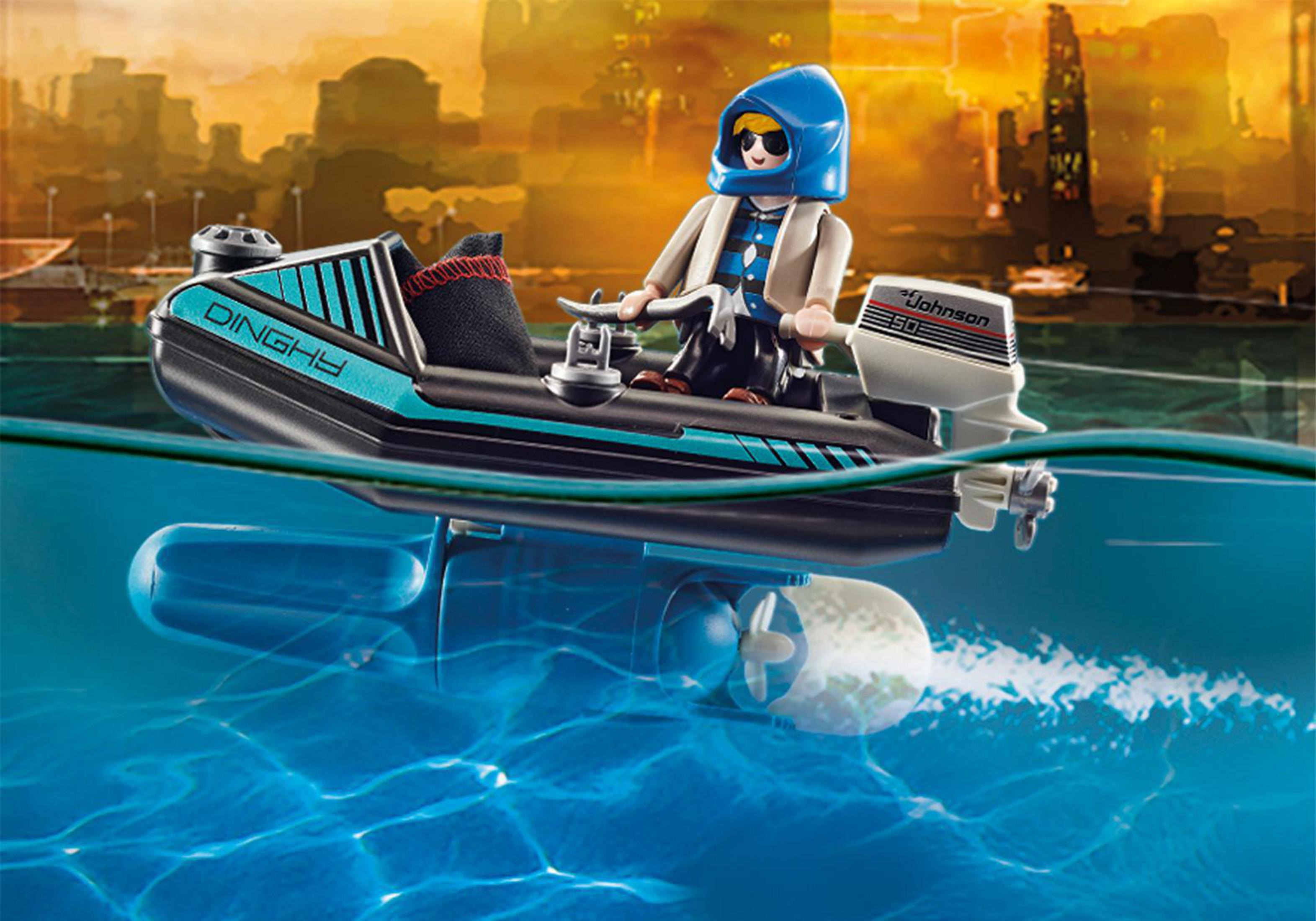Ein Playmobil-Spielzeug eines Mannes auf einem Jetski im Wasser. Der Jetski ist schwarz und türkis.