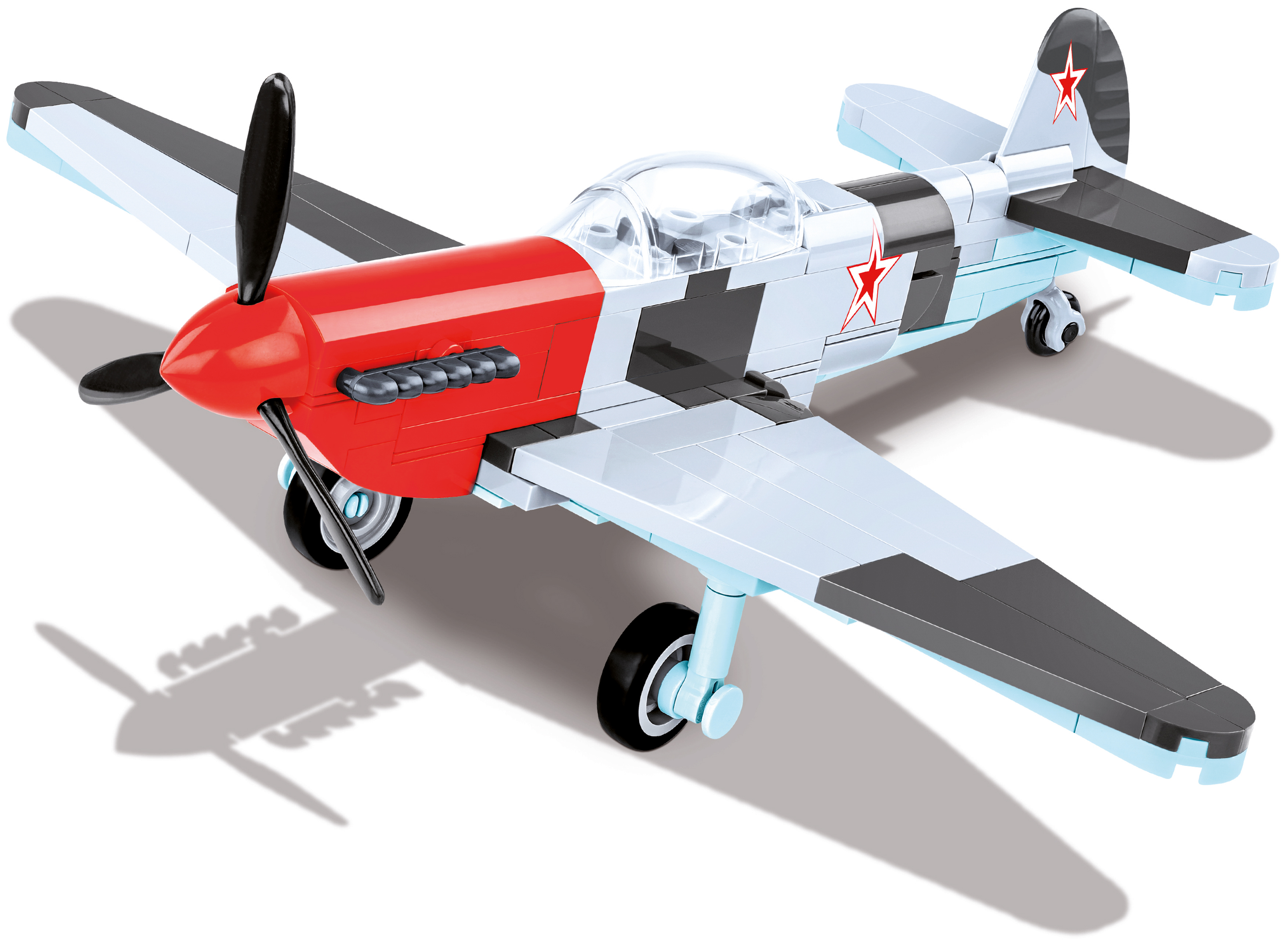 Zabawkowy samolot, czerwony nos, niebieskie i szare skrzydła, ze śmigłem i czerwoną gwiazdą.