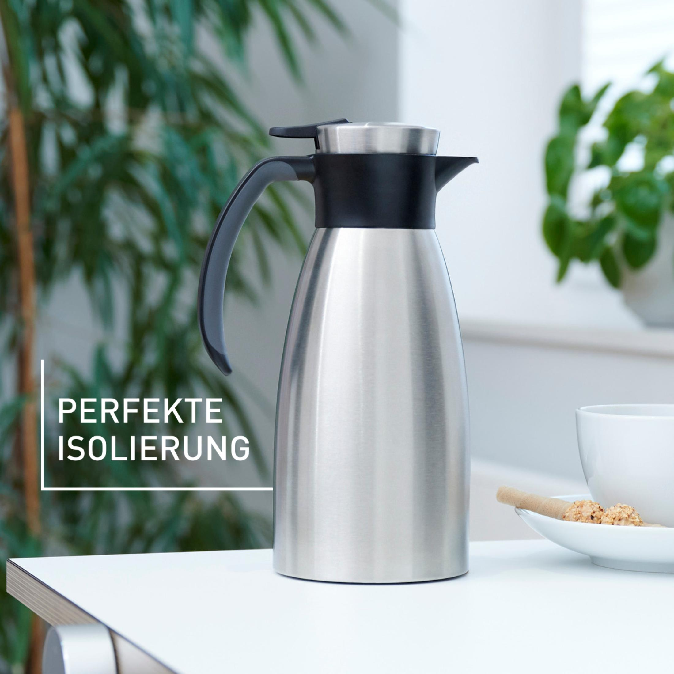Thermos argenté avec anse noire. Texte blanc : ISOLATION PARFAITE. Fond : feuilles vertes.