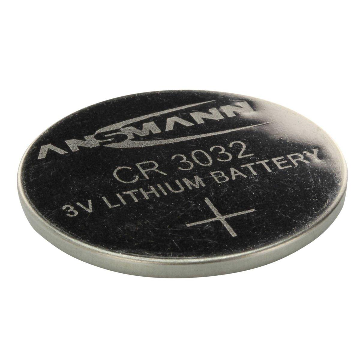 Czarna i srebrna okrągła bateria z napisem "ANSMANN CR 3032 3V LITHIUM BATTERY".