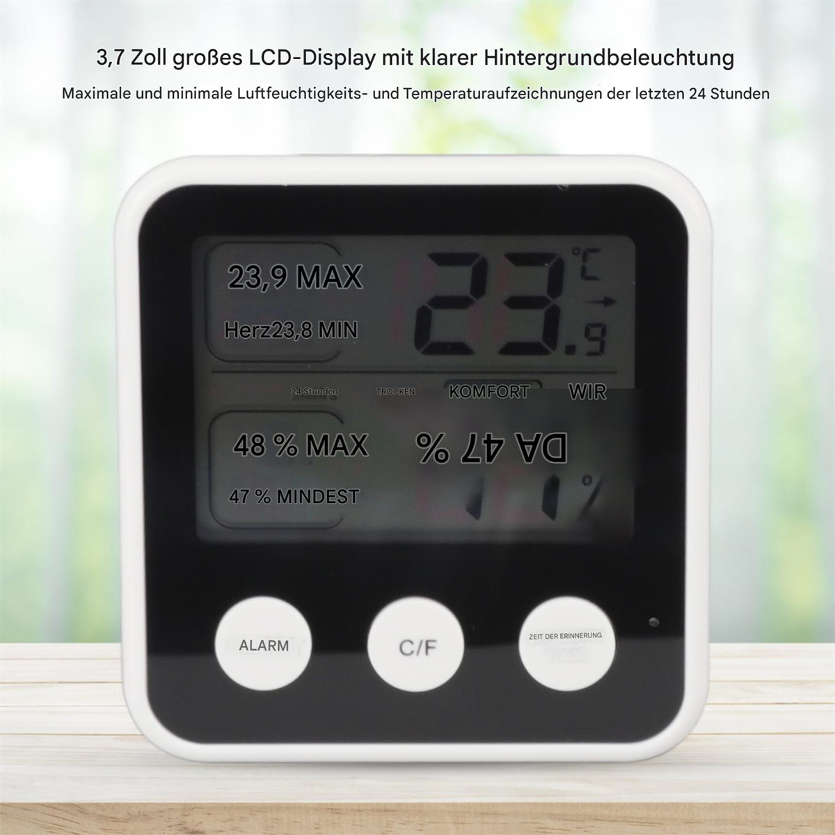 Digitales Thermometer-Display mit Messwerten. Weißer Rahmen. Zahlen zeigen Temperatur, Luftfeuchtigkeit.