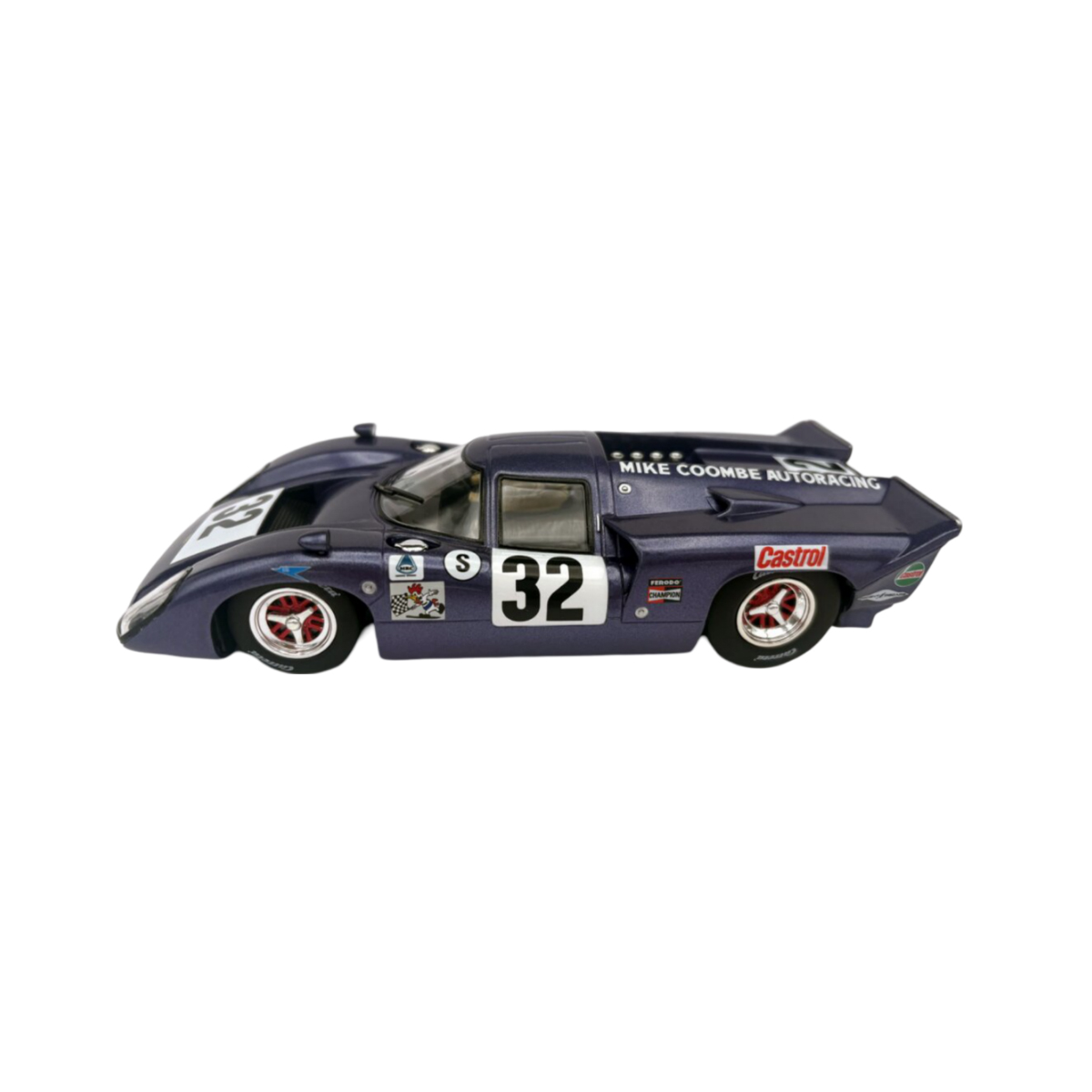 Blaues Spielzeug-Rennauto mit der Nummer 32. Schwarzer Streifen oben, 'Mike Coombe'. Rote Felgen.