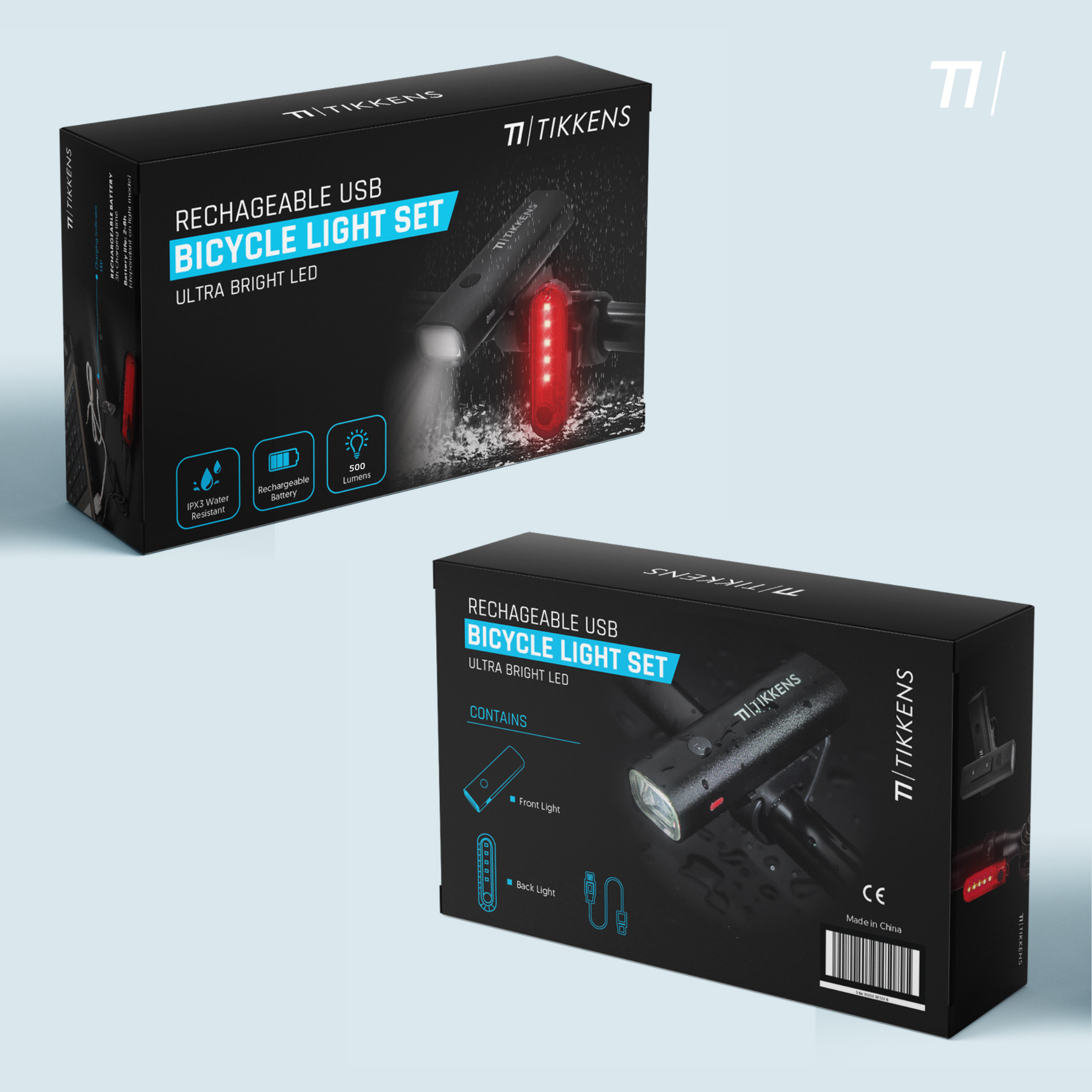 Zwei Kartons mit wiederaufladbaren USB-Fahrradlichtern, einer mit Frontlicht, der andere mit Rücklicht.