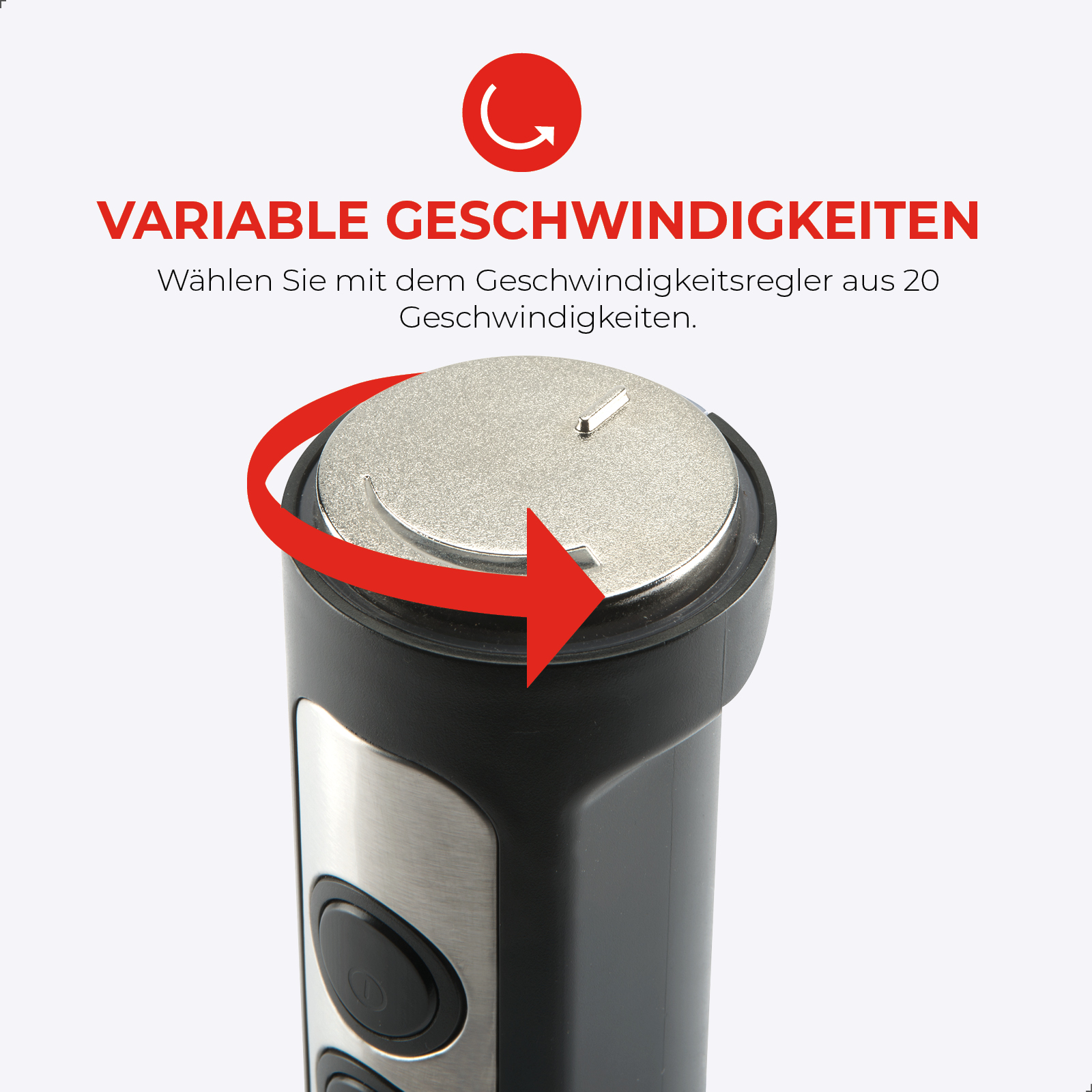 Zbliżenie na górną część blendera ze srebrną pokrywą i czerwoną strzałką wskazującą obrót.