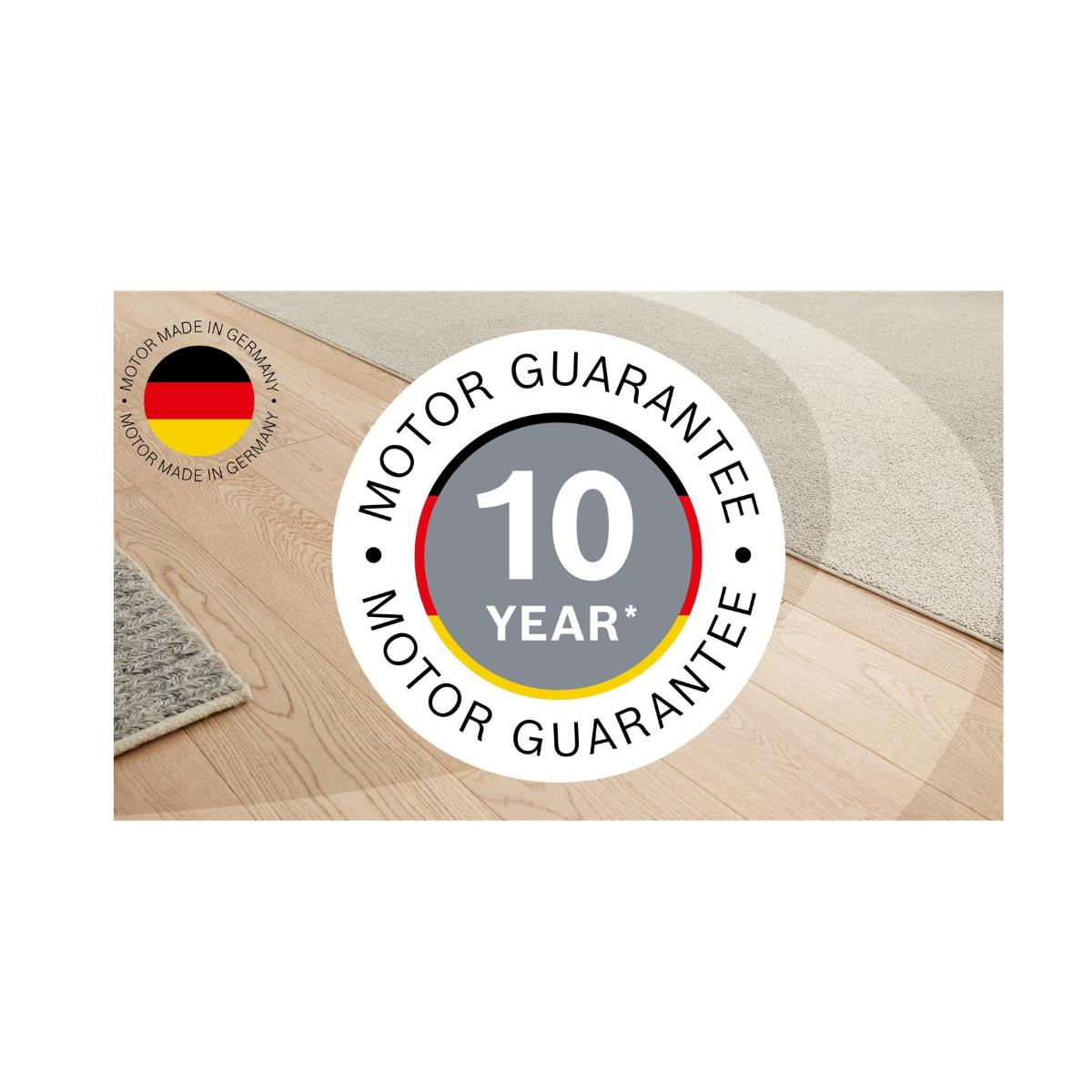 Una insignia circular de garantía del motor con una garantía de 10 años y una alfombra.