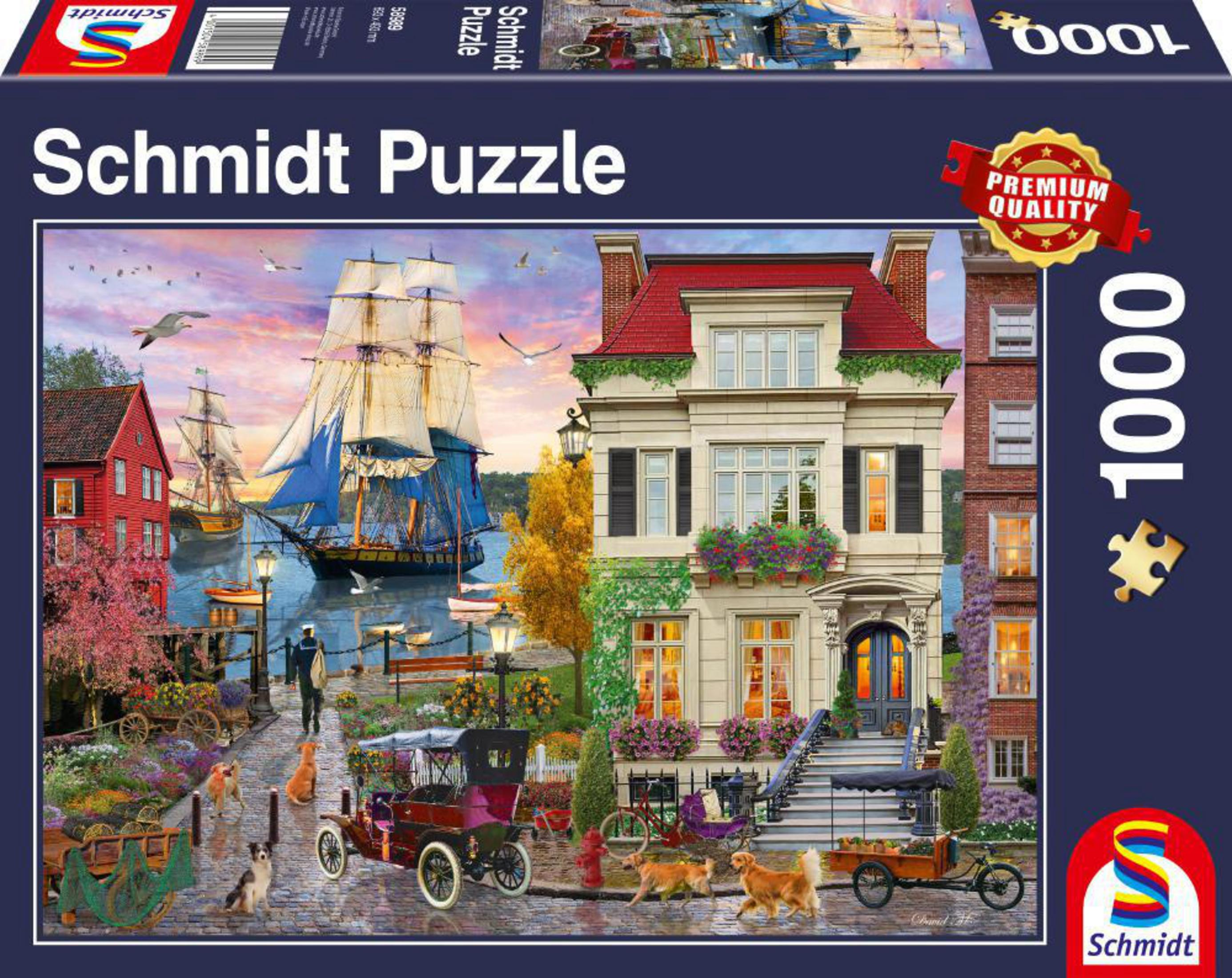 Ein Puzzleschachtel mit einem bunten Bild einer Stadt mit Booten und einem Haus.