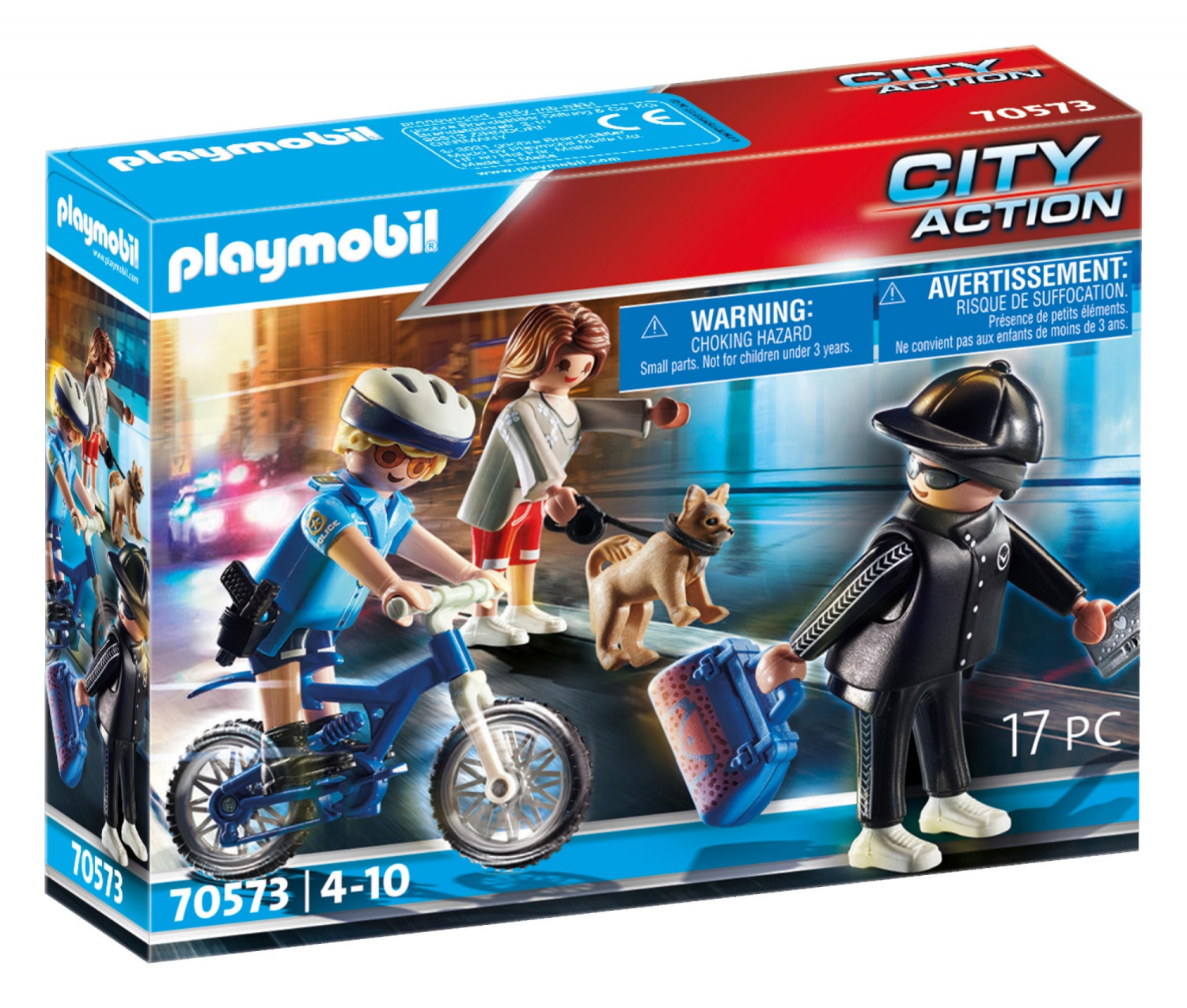 Set scatola Playmobil con tre figure, un cane e una bicicletta, sullo sfondo di una città.