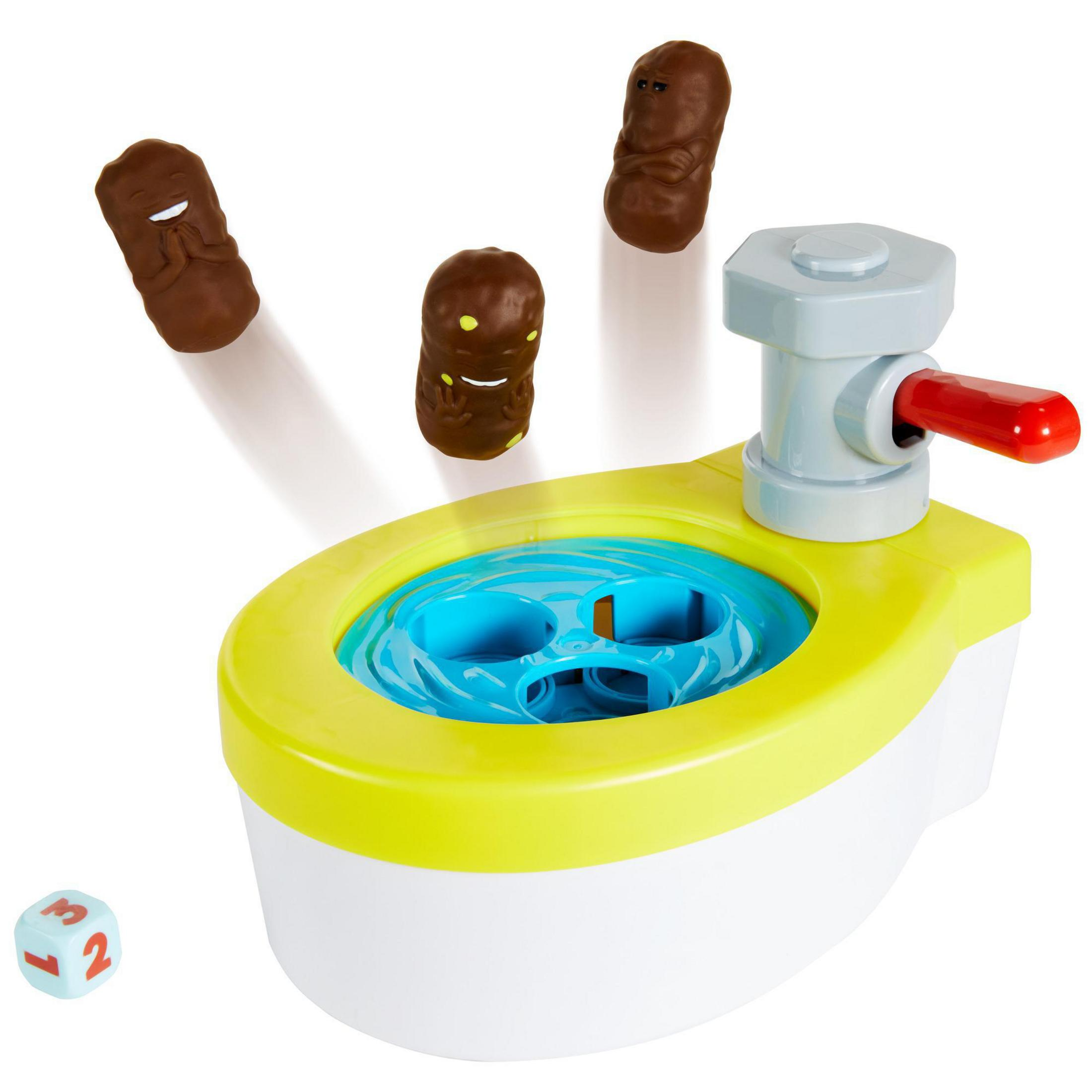 Ein Toilettenspiel mit braunen Kacke-Teilen, die in die Toilette geschossen werden. Ein Würfel ist in der Nähe.