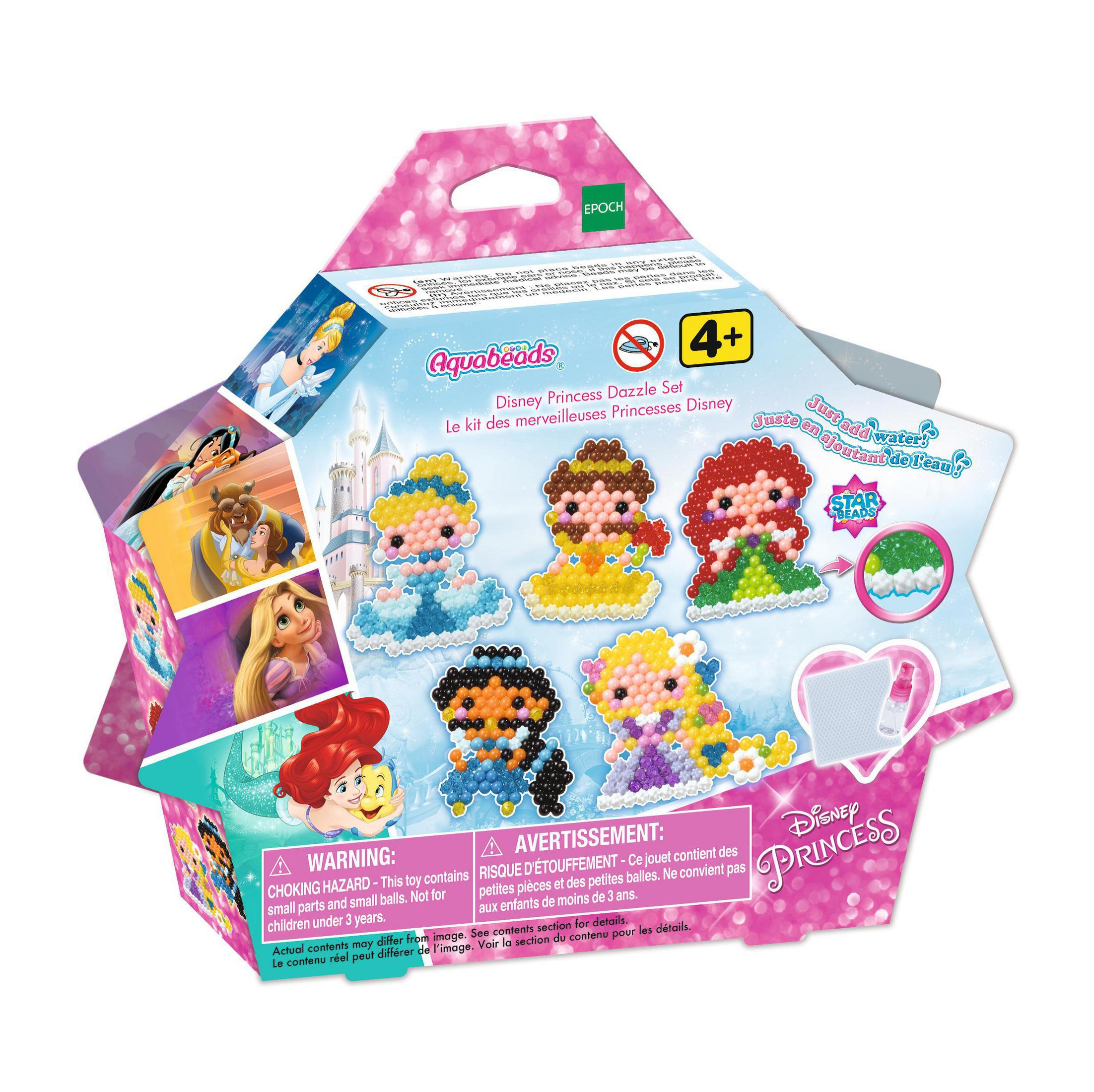 Set Aquabeads Principesse Disney in scatola. Sul coperchio sono esposte sei figure di perline a forma di principessa. Sfondo rosa.