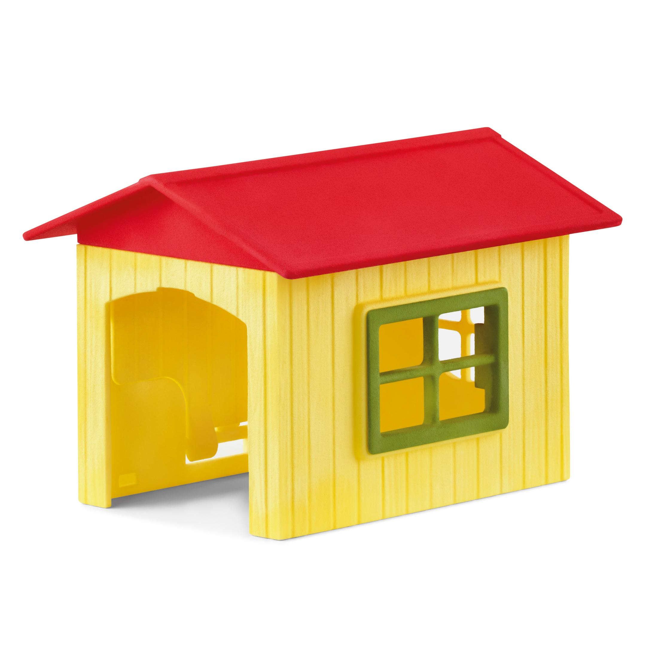 Gelbes und rotes Spielzeughaus. Grünes Fenster. Weißer Hintergrund.