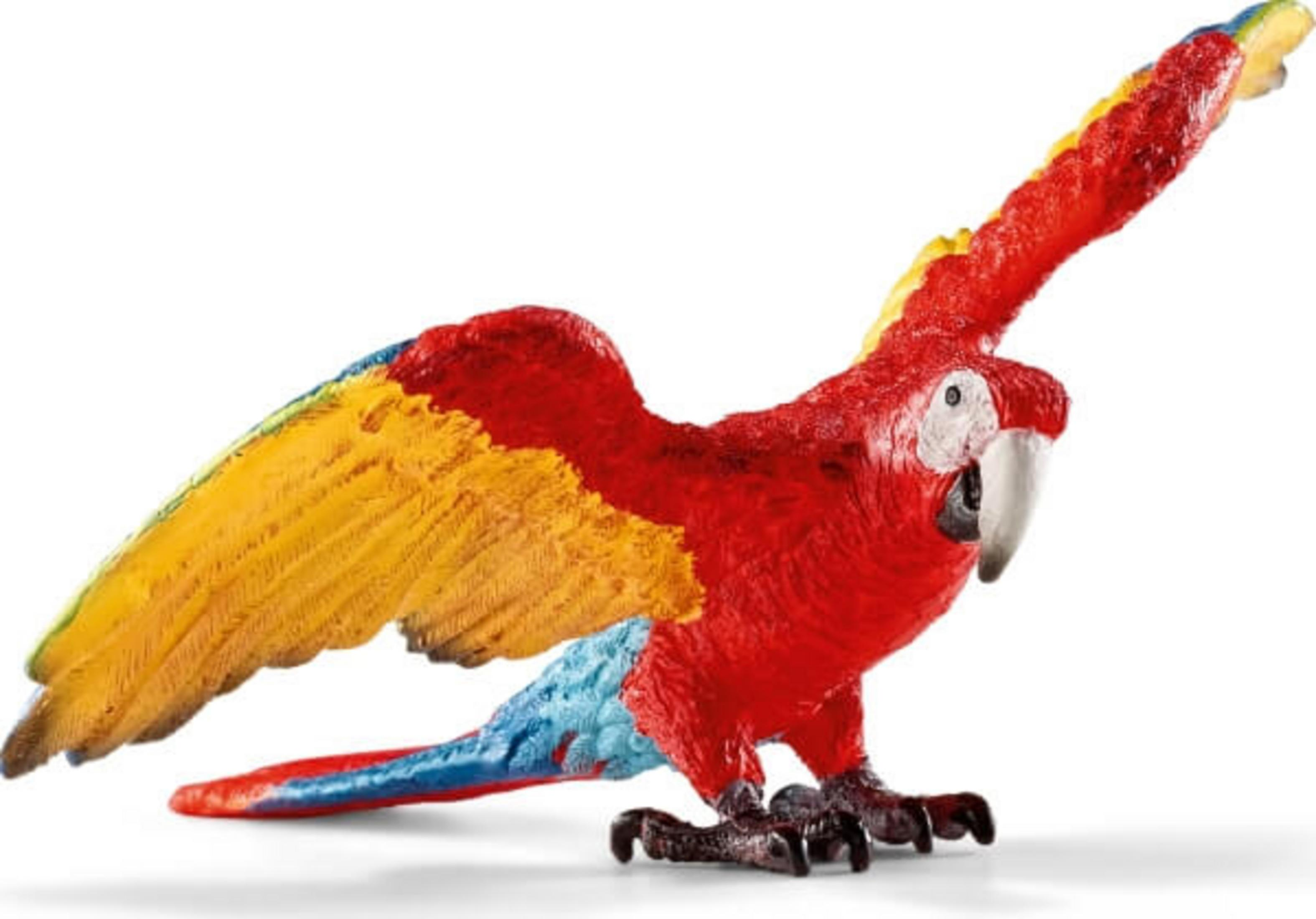 Una statuetta di pappagallo ara rosso, giallo e blu. Il pappagallo è in posa dinamica con le ali spiegate.