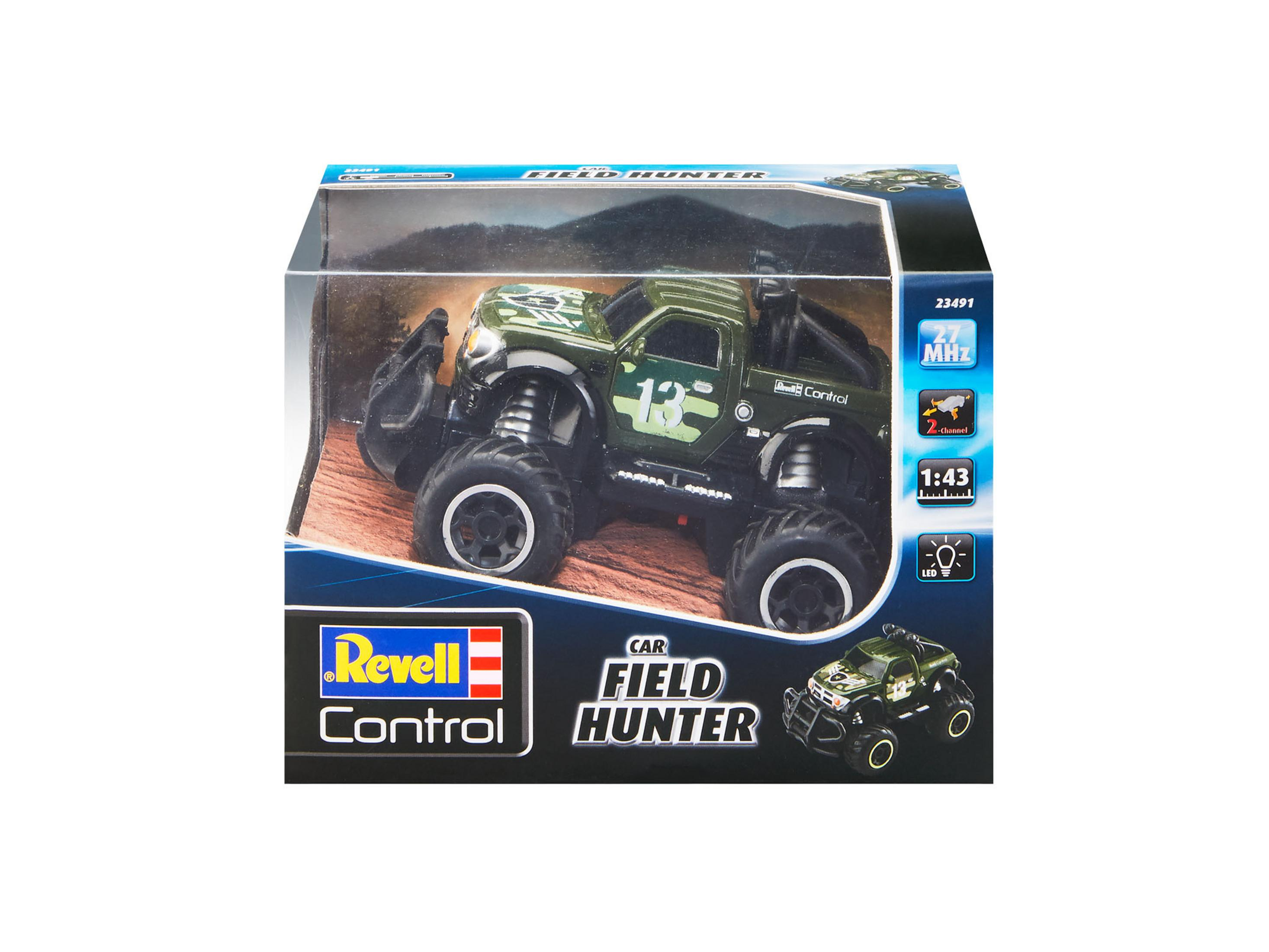 Grünes und schwarzes Spielzeugauto in der Verpackung. Es hat ein 'Field Hunter'-Etikett.
