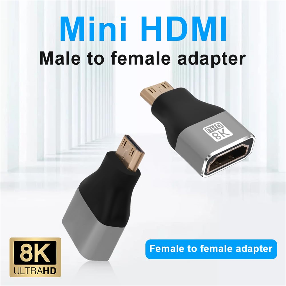 Zwei Mini-HDMI-Stecker-auf-Buchse-Adapter. Einer ist silber und schwarz, der andere ist goldfarben.