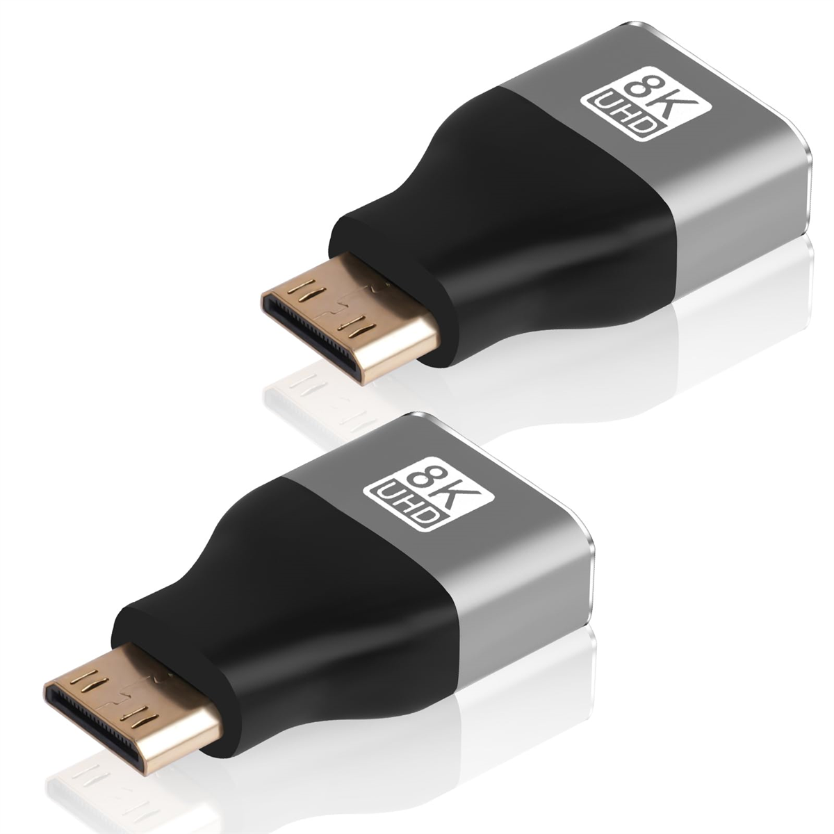 Zwei HDMI-Adapter, metallgrau und schwarz, abgewinkelt, um die Anschlüsse zu zeigen.