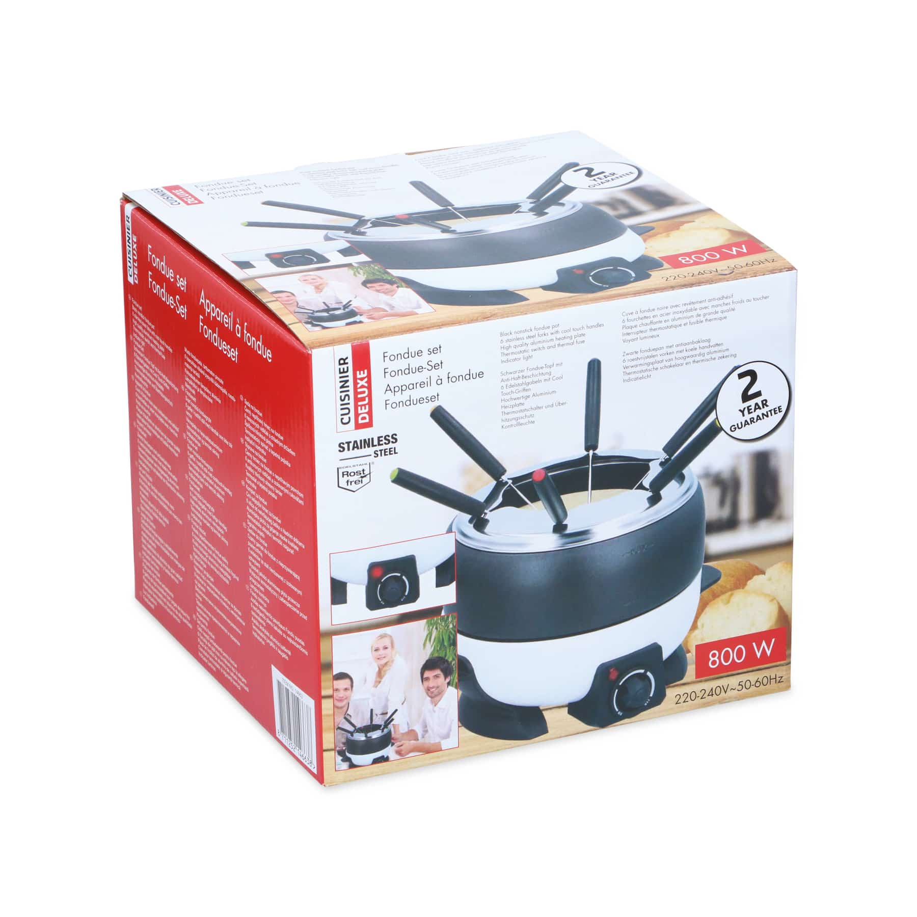 Scatola del set per fonduta, con pentola per fonduta e accessori. Sfondo bianco.
