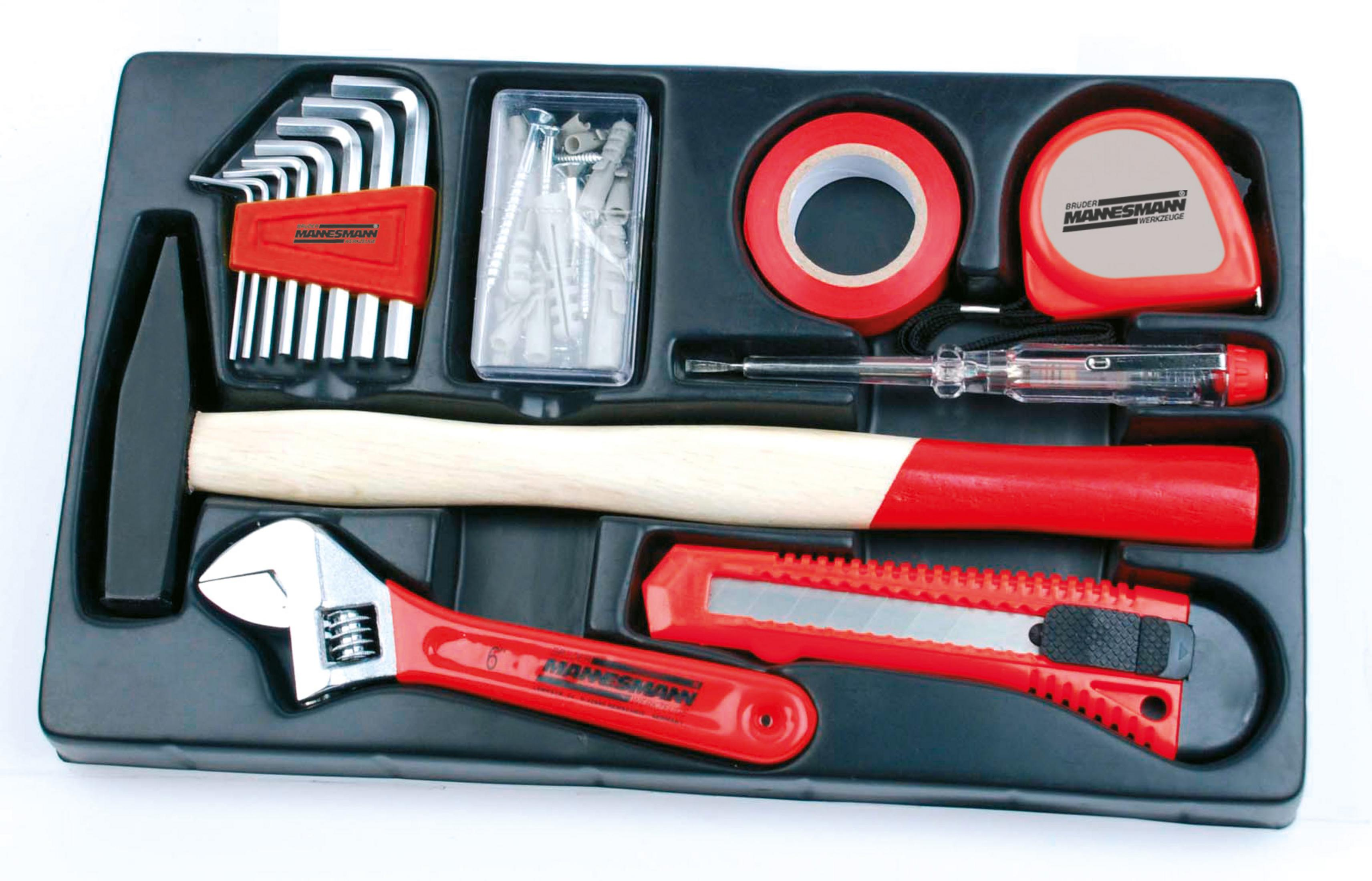 Werkzeugsatz in schwarzer Schale, Hammer, Schraubenzieher.