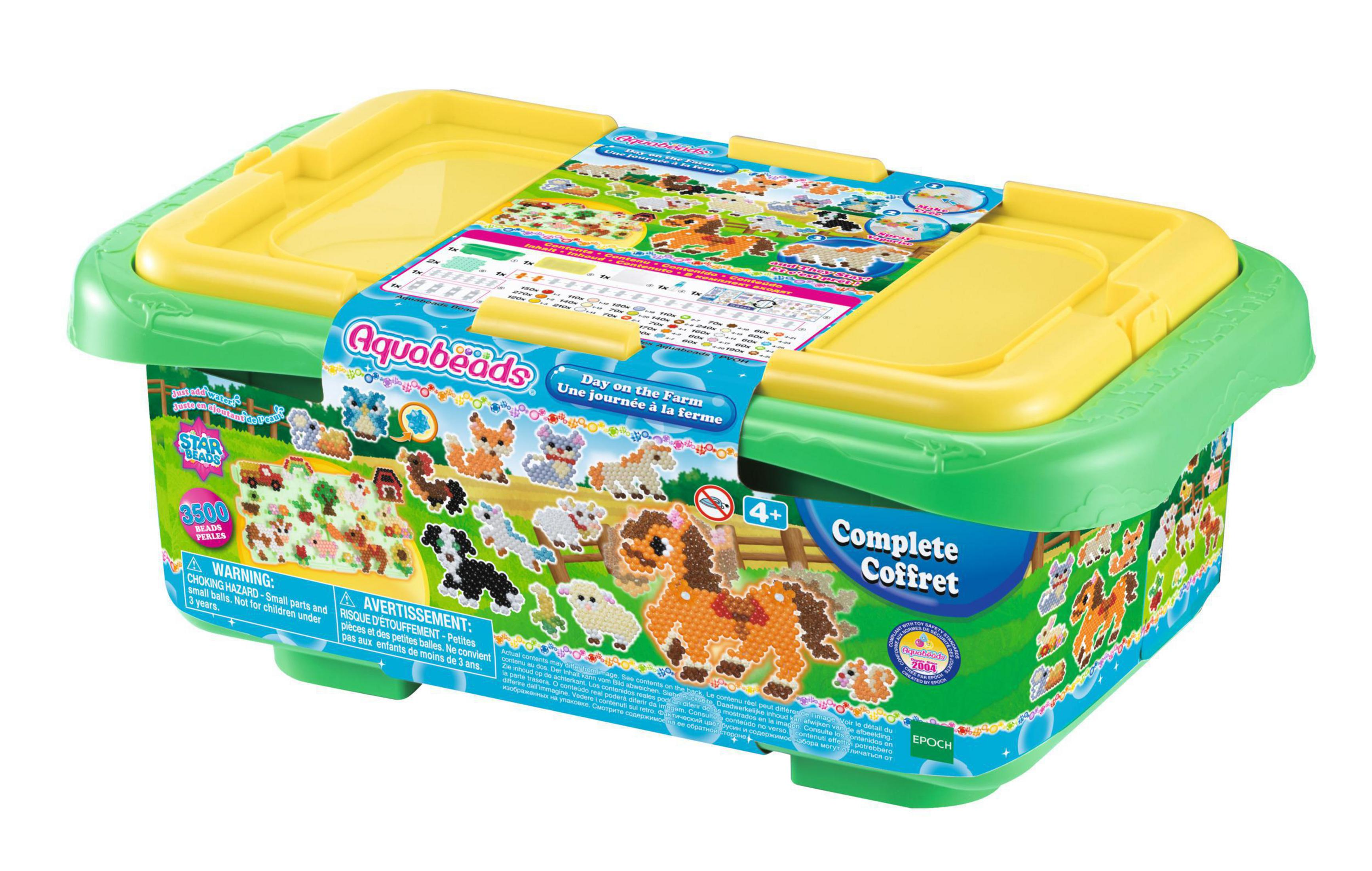 Una caja Aquabeads verde y amarilla con temática de granja. Contiene cuentas y un coffret completo.