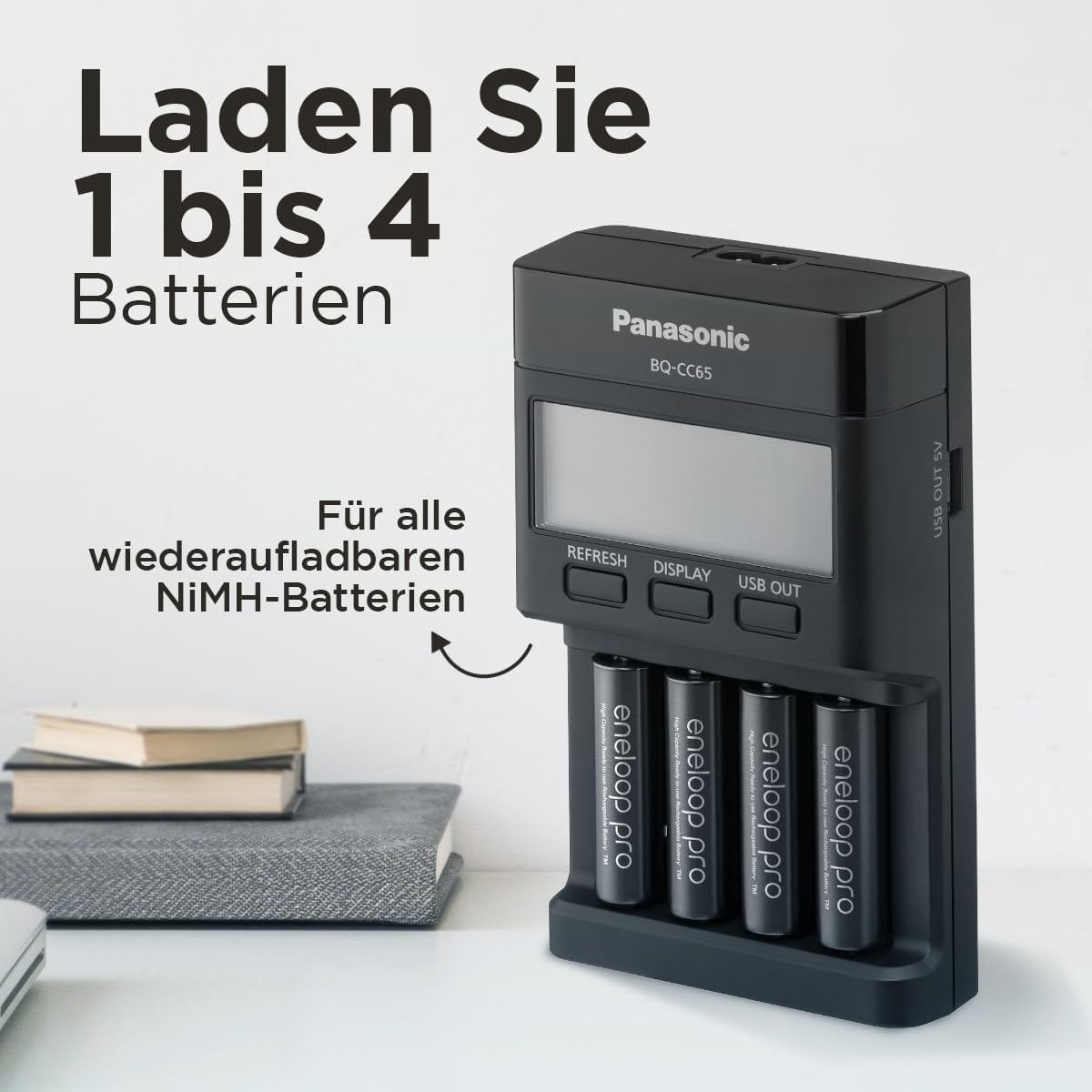 Caricabatterie Panasonic nero con quattro batterie. Testo: 'Laden Sie 1 bis 4 Batterien' e 'Für alle wiederaufladbaren NiMH-Batterien'.