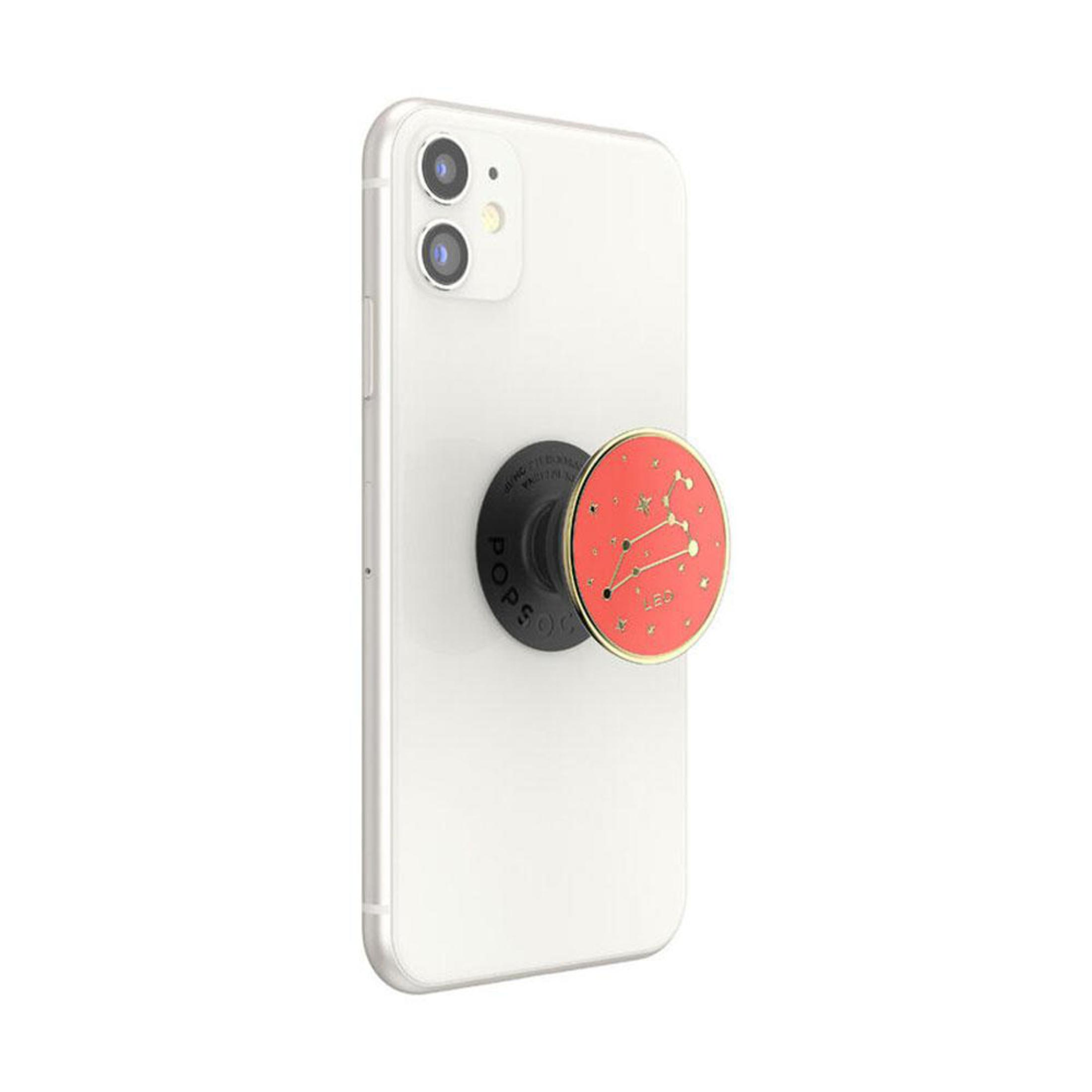 Ein weißes iPhone mit einem roten Pop-Socket, das ein Sternbilddesign zeigt.