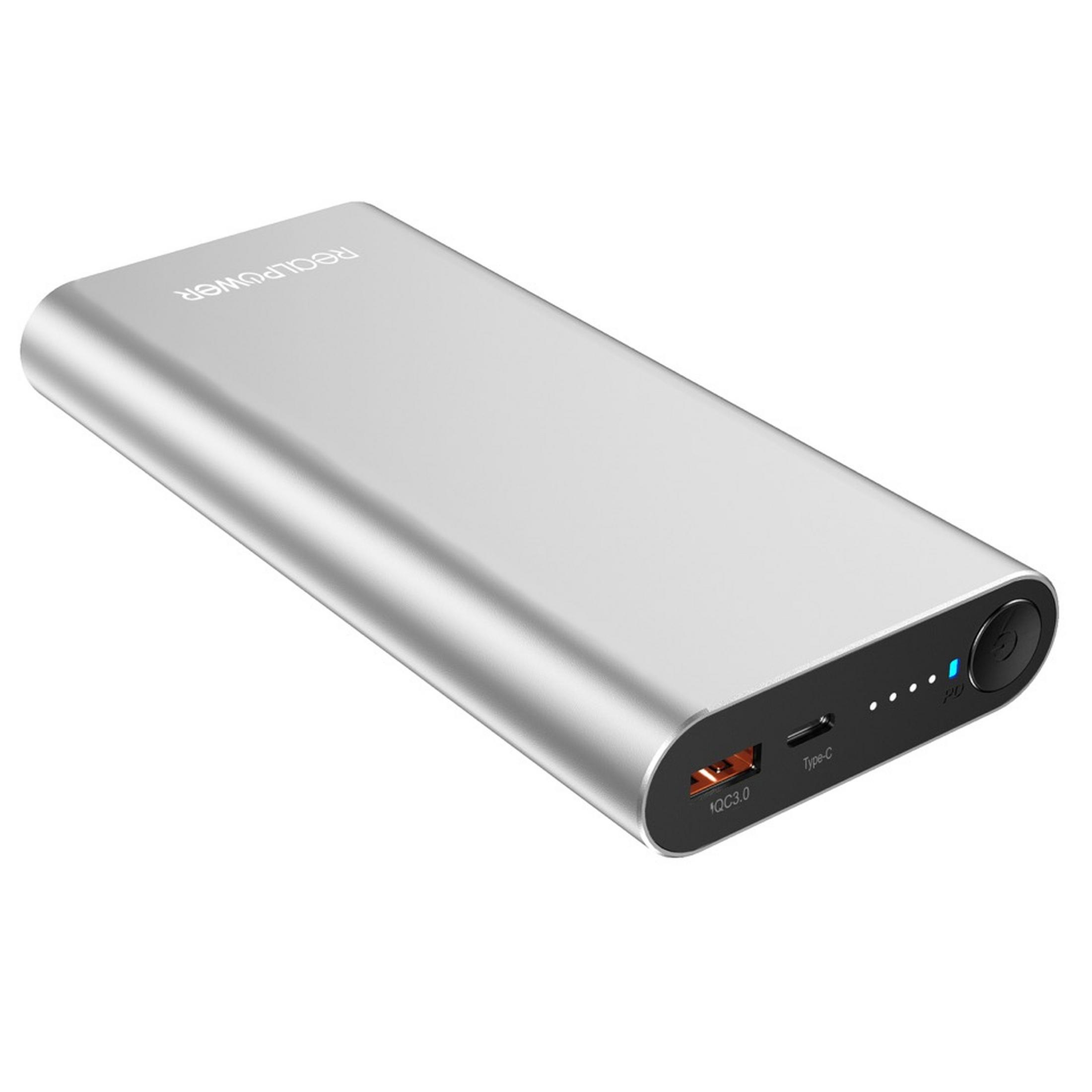 Eine silberne rechteckige Powerbank mit schwarzem Ein-/Aus-Knopf und USB-Anschluss.