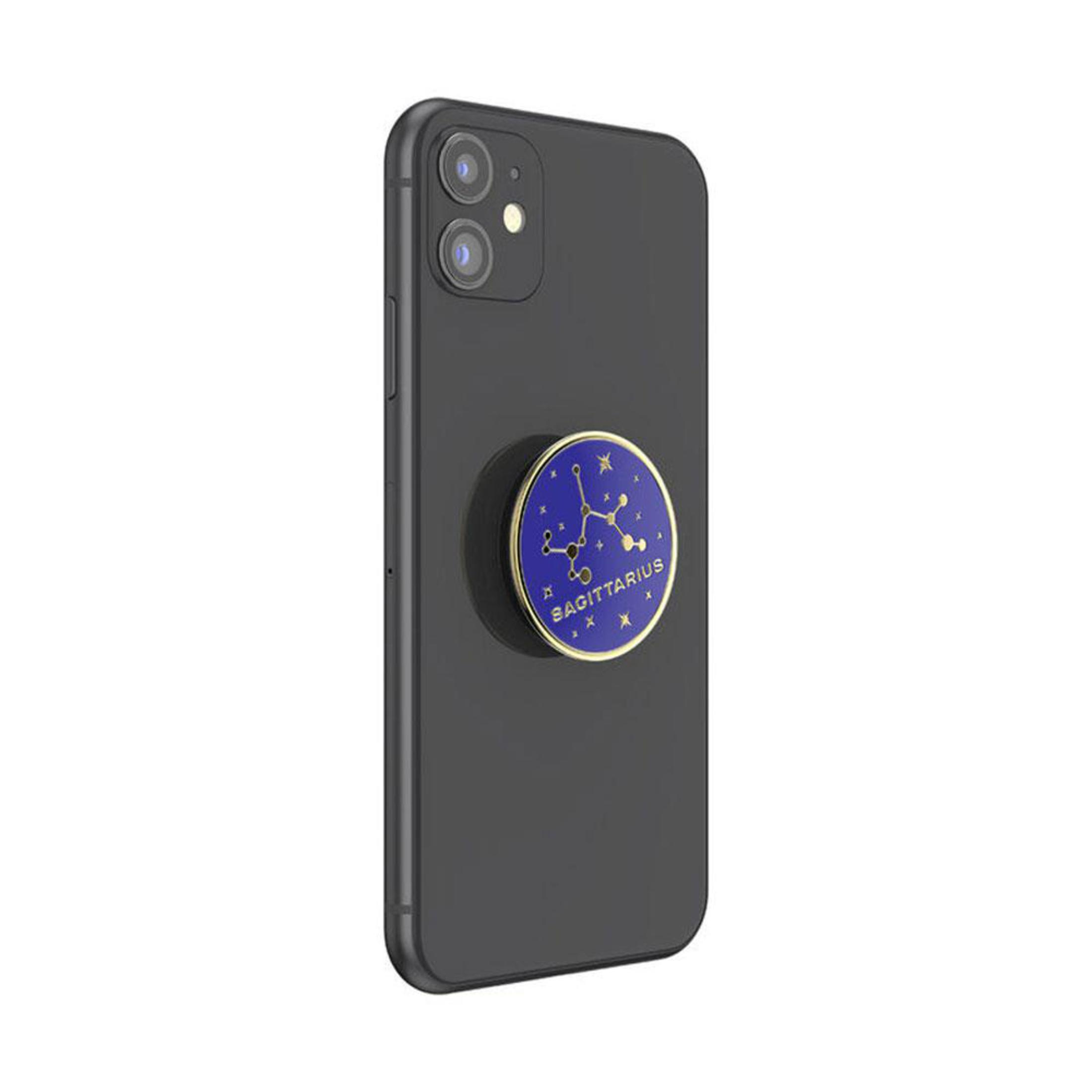 Schwarzes Telefon mit Pop-Socket. Der Pop-Socket hat ein blaues Schütze-Design.