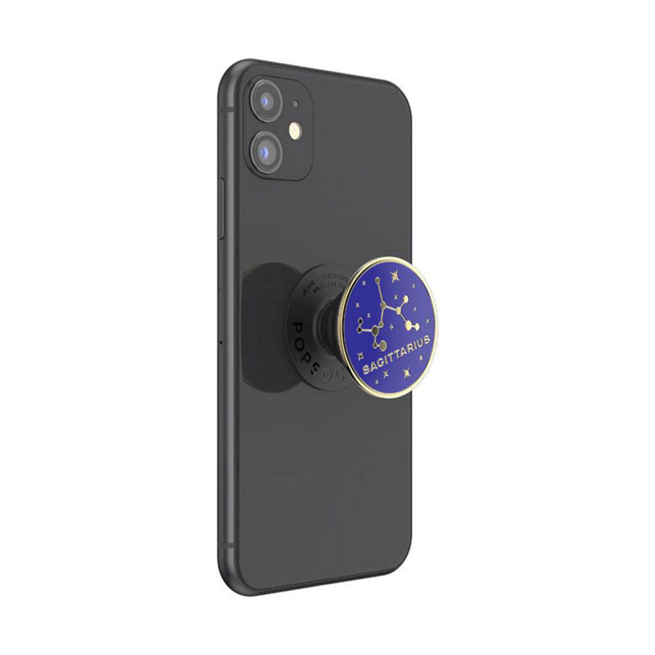 Ein schwarzes Telefon mit einem PopSocket mit dem Schützen-Sternbild.