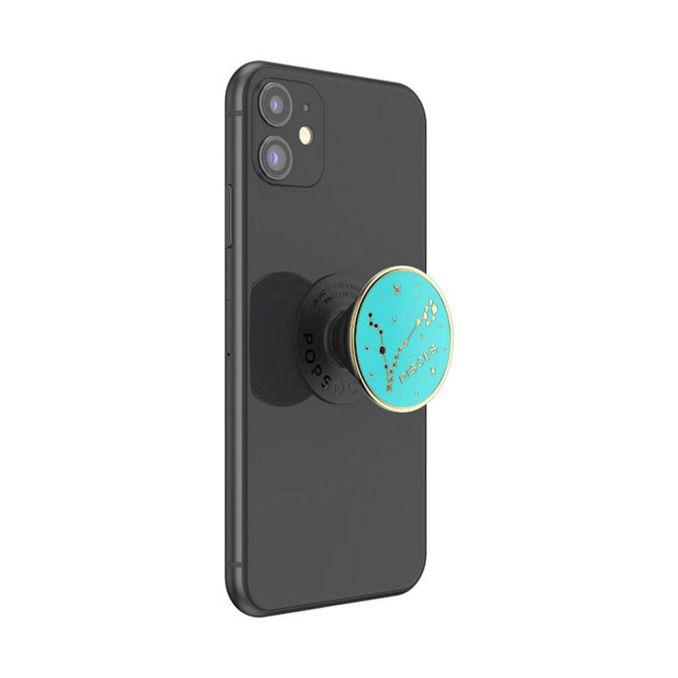 Ein schwarzes Telefon mit einem Fische PopSocket.