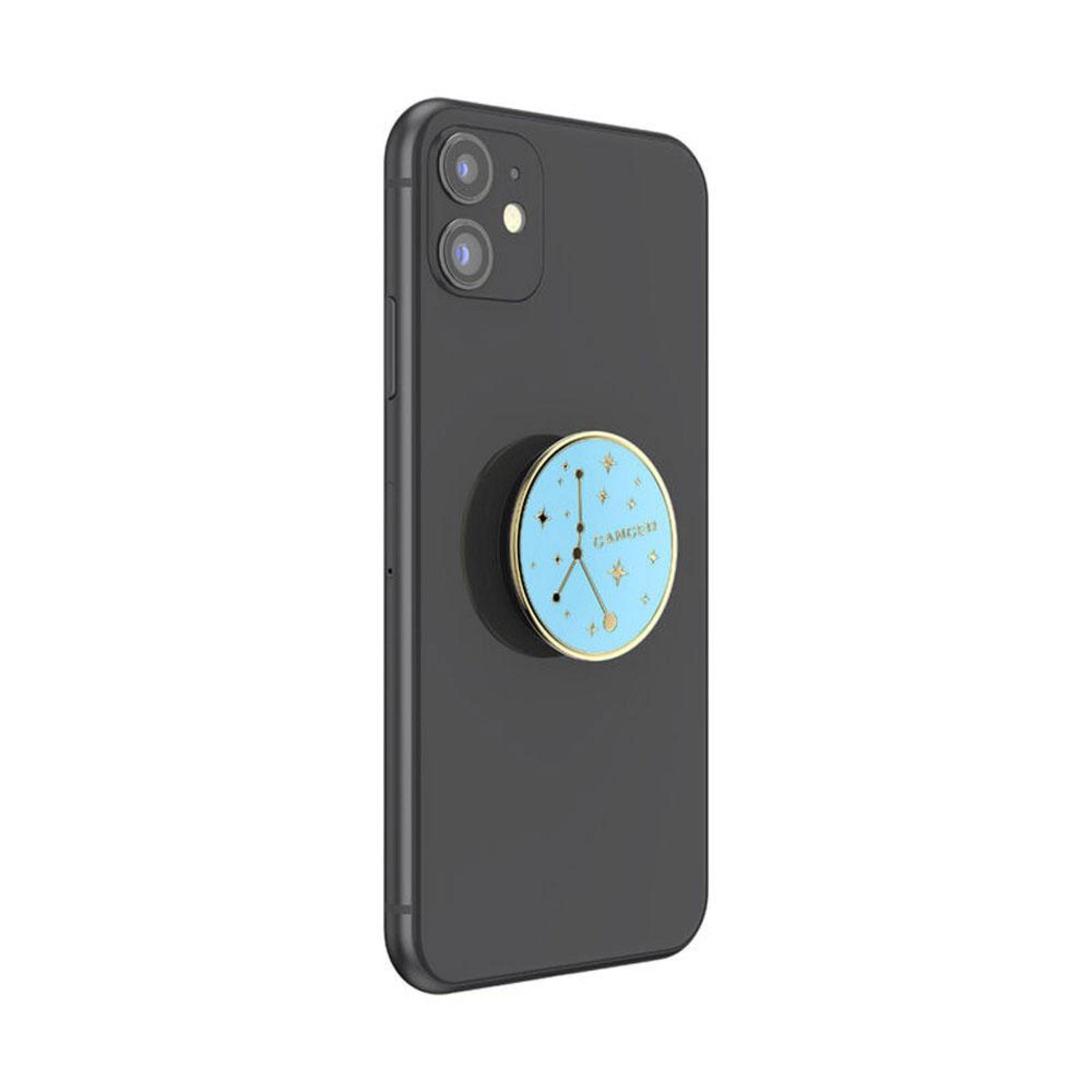 Ein schwarzes Telefon mit einem runden Pop-Socket, das ein Sternzeichen-Design hat.