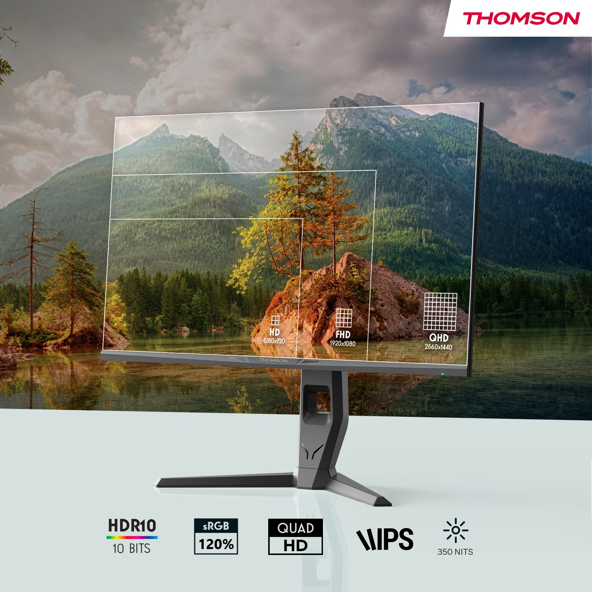Ein Monitor zeigt eine Berglandschaft, mit Auflösungsdetails und Thomson-Logo.