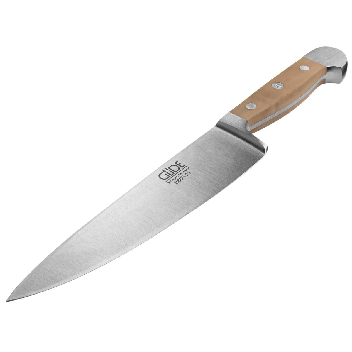Kochmesser mit Holzgriff. Klinge aus Edelstahl. Weißer Hintergrund.