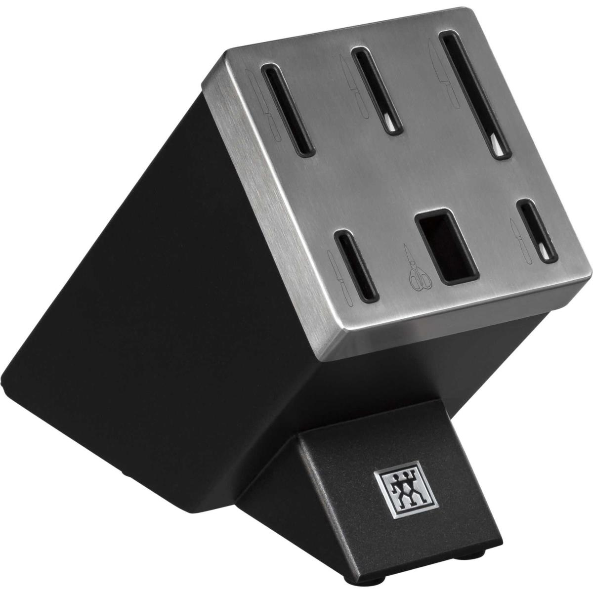 Czarny i srebrny blok na noże. Na górze znajdują się otwory na noże, a na podstawie logo.